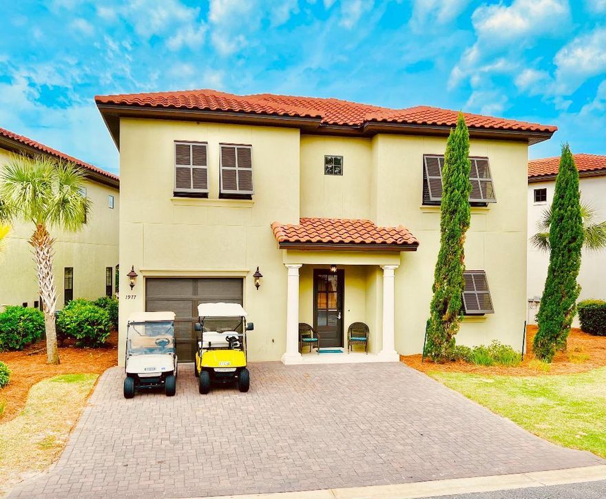 Fully furnished, 1 owner, custom built home in 2016 by Ascott Construction located in the highly sought after neighborhood of Villa Lago within Sandestin resort. This Mediterranean beauty boasts rental projections of $100k. 2786 sq ft, 5 bedroom and 5.5 bath home is the largest home in Villa Lago. It will accommodate and sleep 12 comfortably. This home has a full master bedroom on the 1st floor with 2 additional masters plus 2 other large bedrooms on the 2nd floor. All bedrooms have their own full private en-suite bathroom with an additional powder bath downstairs. The home is perfectly situated 4 lots from the community pool. The large garage can fit a full size SUV with room for beach toys storage. Turn Key and ready to enjoy or become a vacation rental just in time for the busy summer! The 1st floor offers an open floor plan kitchen, with full size island bar to comfortably seat 4 along with a full dining room 
The kitchen has custom glazed cabinetry with Kitchen Aid stainless steel appliances including french door refrigerator with ice maker and inside water dispenser. The living area looks out to the covered patio with tile flooring, including a ceiling fan and grill with views of the interior pond with relaxing sounds of the fountain. 

1st floor master bedroom is right off the living room. It offers a large walk-in closet, dual vanities, walk-in shower with separate toilet room. Upstairs you will find 2 maters bedroom along with 2 additional large bedrooms. One of the master upstairs has a king size bed, his and gel closets, dual vanity with walk-in shower and oversized jetted tub. The other master upstairs has a king bed with walk-in closet. The en-suite bath boasts large dual vanities, walk-in shower and a separate toilet room. The 3rd bedroom upstairs has a queen bed, single vanity and walk-in shower. The 4th bedroom found upstairs is used as a kids room with full size bunk beds, walk-in closet, single vanity and tub/shower combo with sliding glass doors. Upstairs you will also find a dual sliding door storage closet with racks to hold all the linens and games for the kids. Each bedroom has 50 inch wall mounted TVs, ceiling fans and can lighting. A full size garage with extra wide paver driveway to accommodate 3 large SUVs and 2 golf carts. ADDITIONAL FEATURES: 10 foot ceiling, triple stack crown molding and 8" baseboards, No carpet! Tumbled travertine on 1st floor and, engineered hardwood in 2nd floor, Downstairs master has large walk-in closet, Master upstairs has his and her closets with jetted tub, Heavy Solid core doors, Glazed cabinets throughout, Owners closet, Pantry in kitchen, Oversized laundry room upstairs with, counter and wall to wall cabinets for plenty of storage, Floor to ceiling tile in all showers, Turn key rental ready for summer!, Offered furnished. The 2 EZGo golf carts can be purchased separate, Rental projections of over $100k