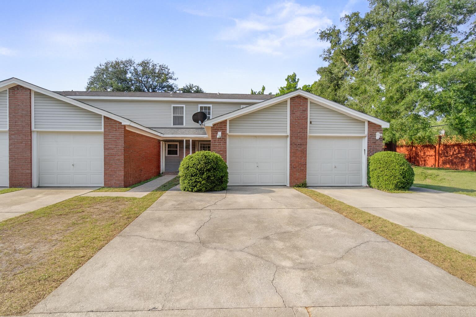 2BR/2BA townhome in the Winterhaven subdivision of Fort Walton Beach. This two-story home features an open living area, functional kitchen, attached garage, and private patio. Conveniently located near schools, shopping, and dining. Perfect for first-time buyers or investors.