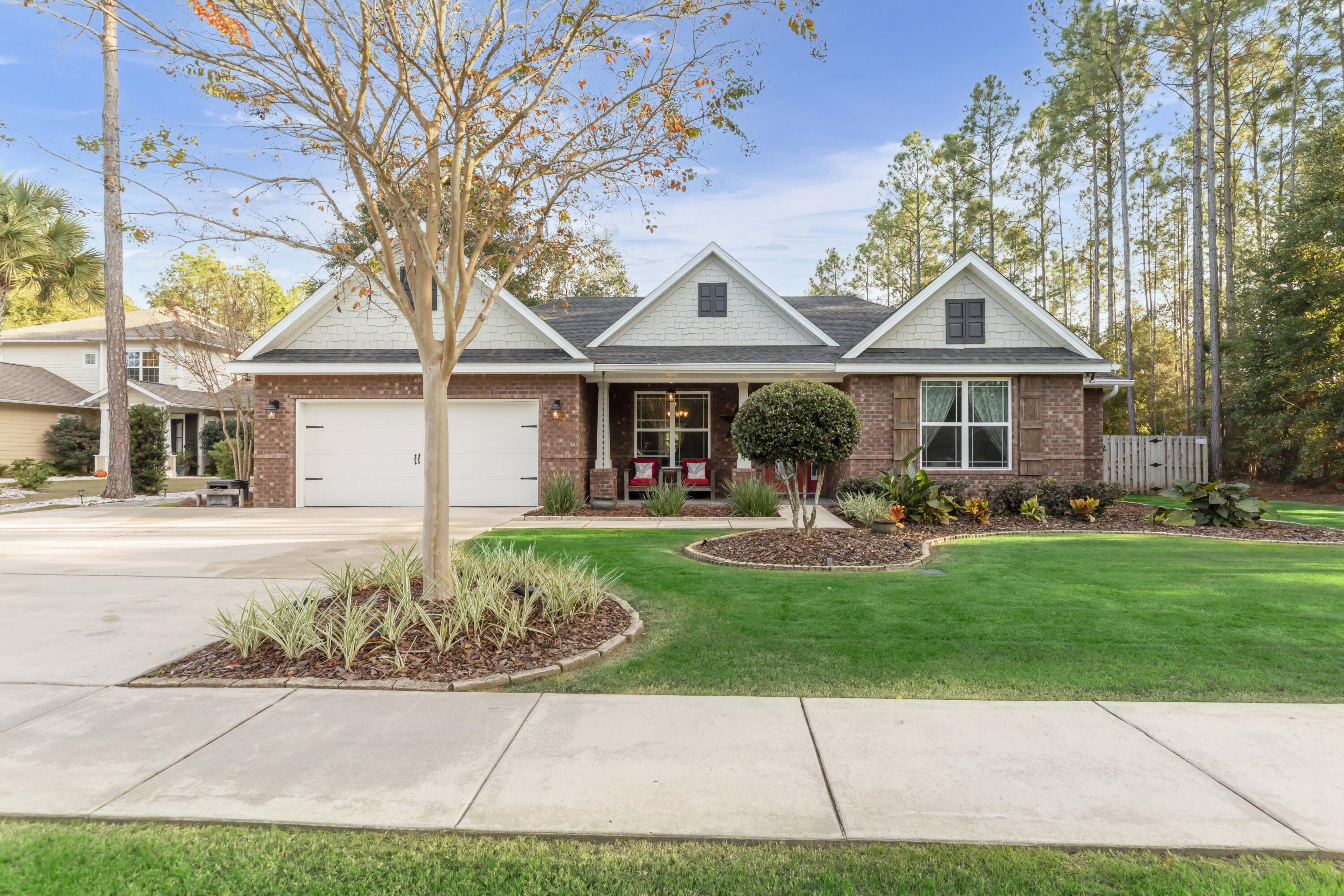 Accepting back up offers!! Now offering $10,000 'ANYWAY MONEY' credit at closing with acceptable offer! This 5 bedroom, 3 bathroom home located in the Symphony neighborhood within Hammock Bay is a must see! This single-story home on the Concert Court cul-de-sac is nestled among mature trees and highlighted with stunning landscape elements. What's more?! It's less that 100 feet from the entry to the Hammock Bay Trail system which allows for miles of beautiful and shady hiking and/or biking. Additionally, this home features an oversized driveway with room for up to 6 cars! The freshly painted front porch adds to the curb appeal. As you step inside, this meticulously maintained and upgraded home welcomes you with a perfect blend of refined comfort and functionality.