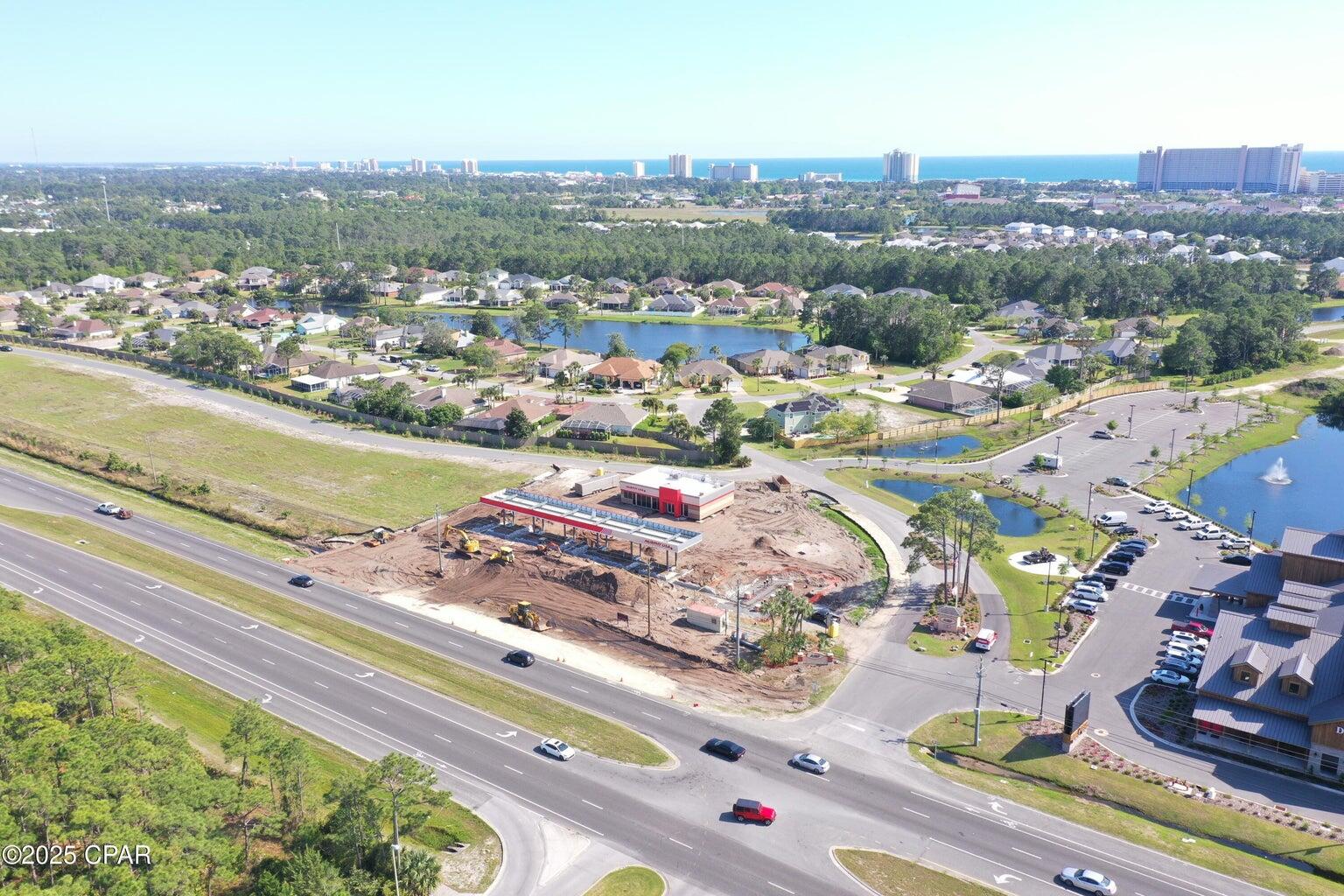 Panama City Beach Parkway land available for ground lease. The property includes two parcels that are 1.075 and 0.99 acres, so 1 to 2 acres available. The owners would consider a build-to-suit for long-term credit tenants. Murphy USA Convenience Store is under construction on the west side. A new traffic light is going in on the corner of North Glades Trail. Duplin Winery is located west of the property. The access road on the south side of the property also has an exit to the east. The sites are cleared, filled, and ready for development. Zoned 'Commercial High Intensity (CH)' within the City limits of Panama City Beach. Master stormwater retention is in place. Utilities are stubbed-out to the property.