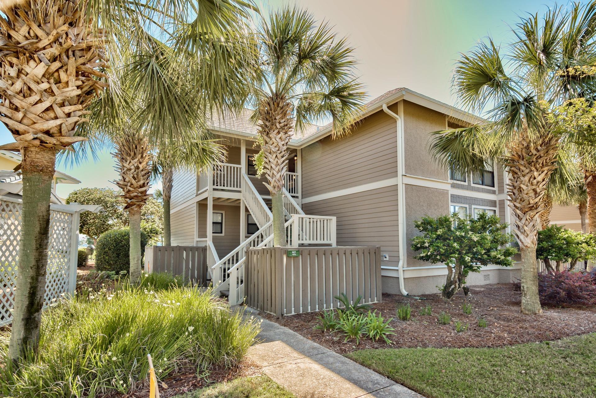 ONE OF THE BEST VALUES IN SANDESTIN! This coveted corner unit, bay facing in very desirable Harbour Point! It all starts with this spectacular WATERFRONT and golf course view. This condo enjoys a private community pool with plenty of parking and a dedicated golf cart charging station for the owners/guests. Laminate wood floors throughout, carpet in the bedrooms. Reglazed tubs, upgraded vanities, silestone in kitchen, new doors throughout. New roof in 2016, new Hardie siding in 2013, new 400' seawall in progress. One of the few waterfront properties available in Sandestin Resort under $300K. This condo is being sold fully furnished and has never been on a rental program. Rental income for other 2 bd. units within arbour Point exceed $35K+/yr