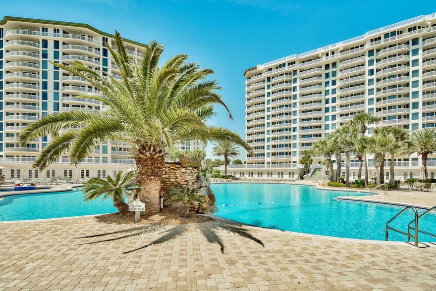 Rarely available & recently updated ground floor unit with direct access from your sliding glass doors to the spectacular gulf front pool & white sandy beaches. Generous indoor living space with unparalleled outdoor gulf-front living space on the terrace. Expansive 11 foot ceilings with a beautiful modern kitchen. Enjoy the convenience of a private enclosed underground parking garage with a door & a storage unit on the ground level just outside the unit. The laundry room has been converted to a small room with bunk beds, perfect for small children and a way to maximize rental income. Silver Shells Resort amenities include: 24/7 gated and guarded entrance, cardio and weight rooms, tennis courts, basketball , a 7500 square foot lagoon pool, an indoor/outdoor heated pool & several hot tubs. This 27+ acre private resort  also has on site the Silver Shells Day Spa, Ruth's Chris Steakhouse and the Sand Bar on the beach, 1000 feet of beach frontage. 