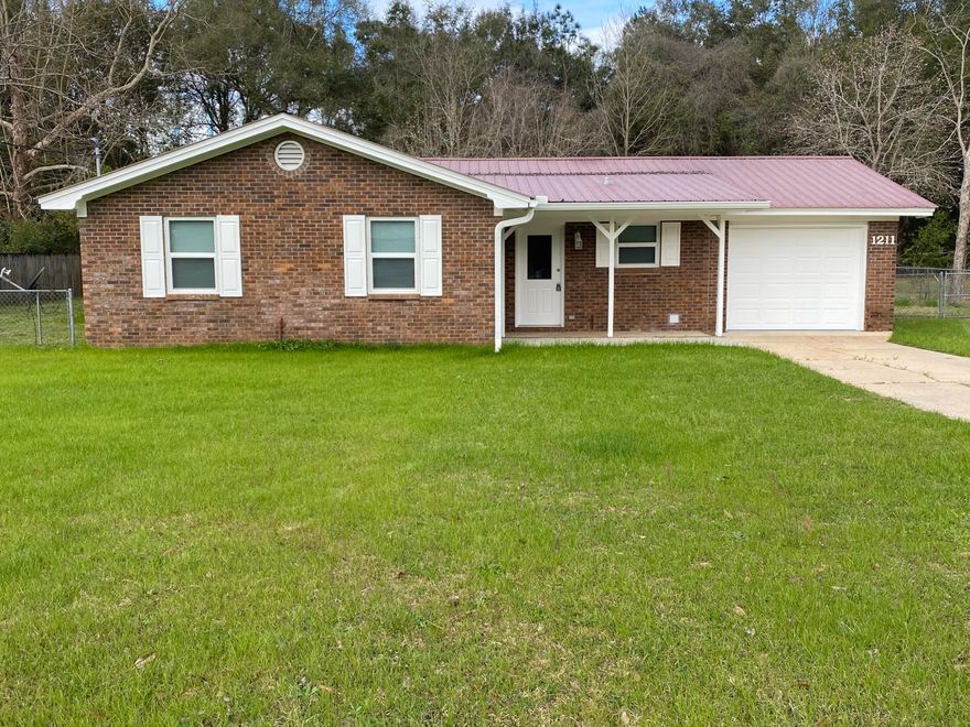 Huge fenced in back Yard, great Location! Welcome Home, 3 bedroom two bath home. Metal roof Tile floors Huge Master Bedroom with a Walk-in Closet and a huge Living Room.