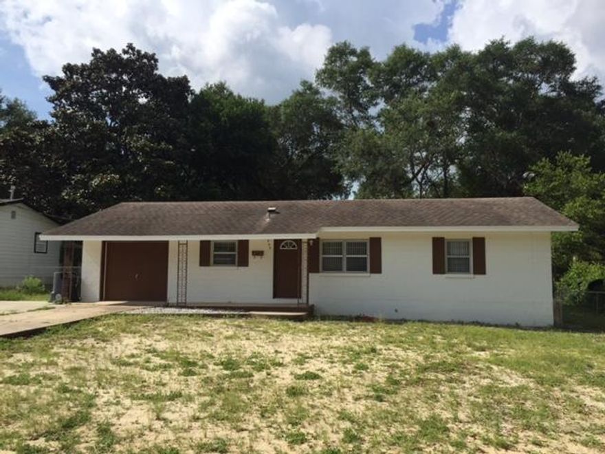 3 bedroom family home in Valparaiso -close to schools, medical facilities and Eglin AFB, the area's largest employer. Well maintained with new HVAC duct work replaced in 2015. Large yard front and back and fenced in rear. Big driveway for rec vehicle parking. Complete repaint inside. Common flooring (tile) throughout home. Kitchen face lifted in 2008. Roof is approximately 9 years old. Steel reinforced garage door. Clean and neat and ready to go. A smart buy for a small family or investor. Take a look.