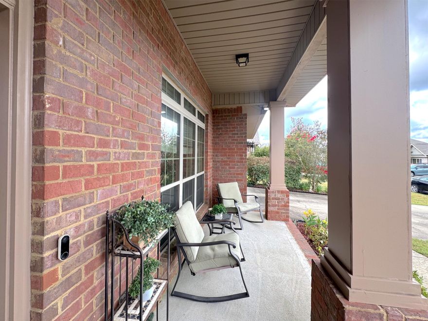 Spacious and beautifully designed home featuring an open floor plan with tray scoop ceilings. This 4 bed 4 bath residence includes two ensuite bathrooms and a convenient powder room. The large kitchen offers granite countertops and flows seamlessly into the formal dining area. The living room showcases a beautiful fireplace and is filled with natural light from abundant windows. A den/office provides flexible space, while the expansive owner's suite offers a private retreat. Enjoy year round living with a Florida room that leads out to a beautiful screened in porch. The fenced in backyard is perfect for relaxing or entertaining.