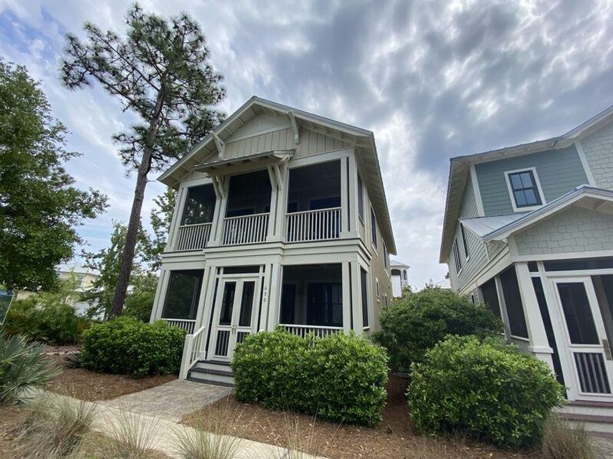 High-quality construction home in NatureWalk at Seagrove, nestled between protected borders of Point Washington State Park and only minutes from 30A. This  home offers 2218 square feet, 3 bedrooms, 3.5 bath. Features include: hardwood floors, granite, Cafe stainless steel appliances, spacious porches for outdoor entertaining and 2 car garage with alley access. This naturally beautiful community features resort-style amenities for the entire family to enjoy. ''The Gathering Place,'' NatureWalk's amenity center will include: a resort-style beach entry pool, lap pool, serene adult lounge pool, tot lot, multiple entertainment areas, and a fire pit with group seating - all encompassed by the beauty of Point Washington State Park.   Furniture conveys but artwork does not.