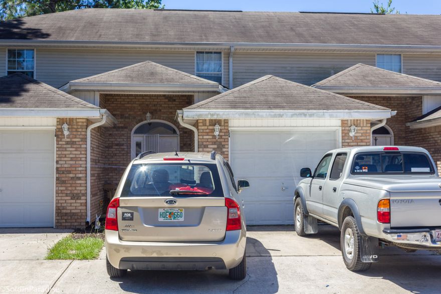 This lovely 2 story townhome is located in a quiet neighborhood in Mary Esther. The living, kitchen, and dining areas are open and flowing. The main living space was updated with ceramic tile flooring. Glass sliders lead you to the private fenced in deck and yard. Each of the two bedrooms feature their own bathroom and ample closet space. The laundry and half bath are located off the entry hallway. A one car garage provides additional storage or parking. Just minutes from beaches, shopping, schools, and only 6 miles from Hurlburt Field makes this a prime location. This unit has been well-maintained by the owner and is currently a rental unit. Buyer to verify all dimensions.