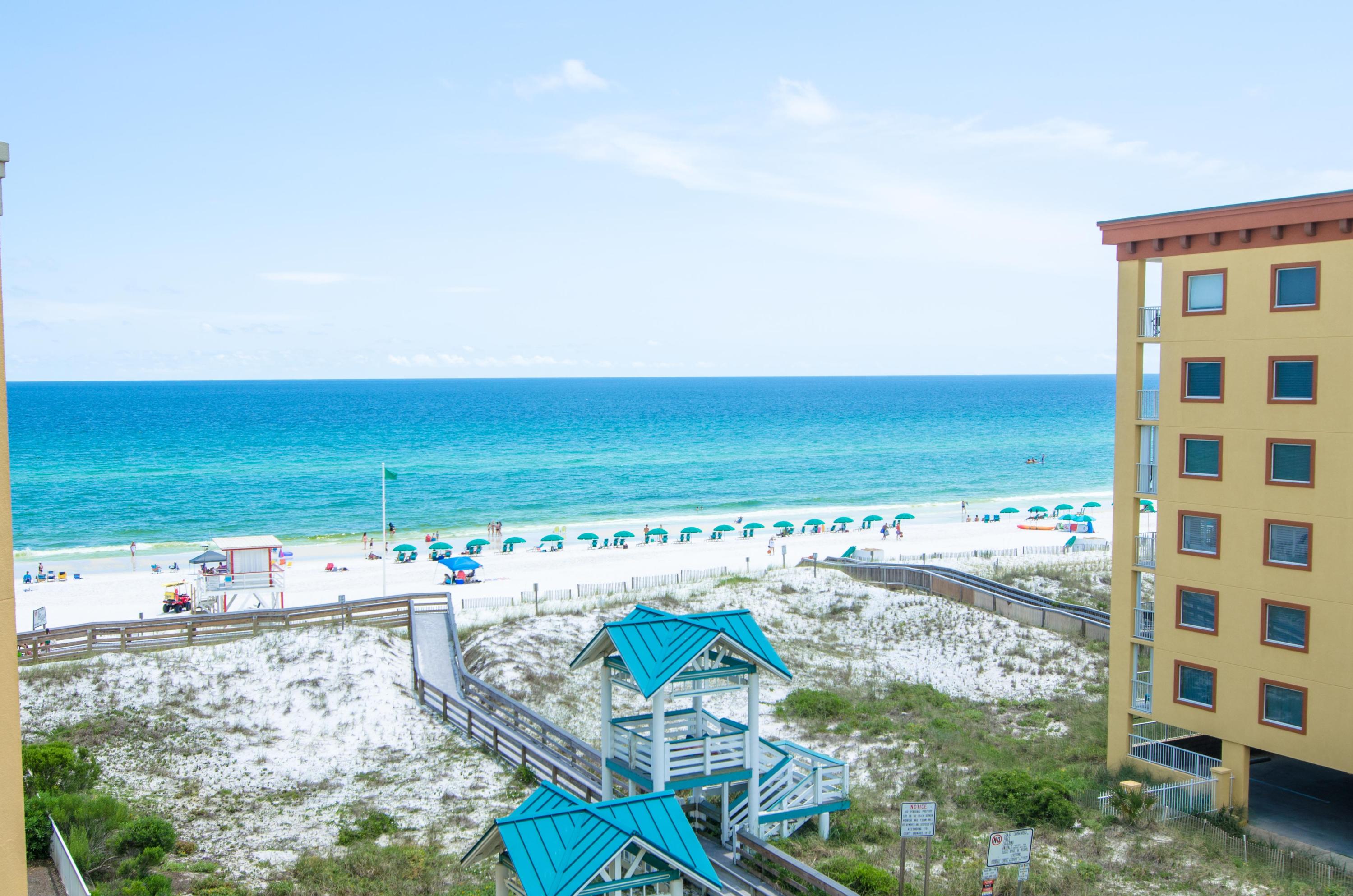 A stunning coastline view is yours in this glorious 3 bedroom condo at Azure! Upgrades include tile floors, stainless steel appliances, granite counters, beautiful furnishings and a large balcony to soak in all the views. The Master Suite is Gulf front and has balcony access plus a spa-like bath with soaking tub, separate shower and his/her closets. This condo is a rental powerhouse, grossing up to $50K! Enjoy the resort style amenities at Azure including 2 pools, 2 hot tubs, a spray park, fitness center and a large boardwalk to access the beautiful beach. This is a turn-key property all furnishings convey!