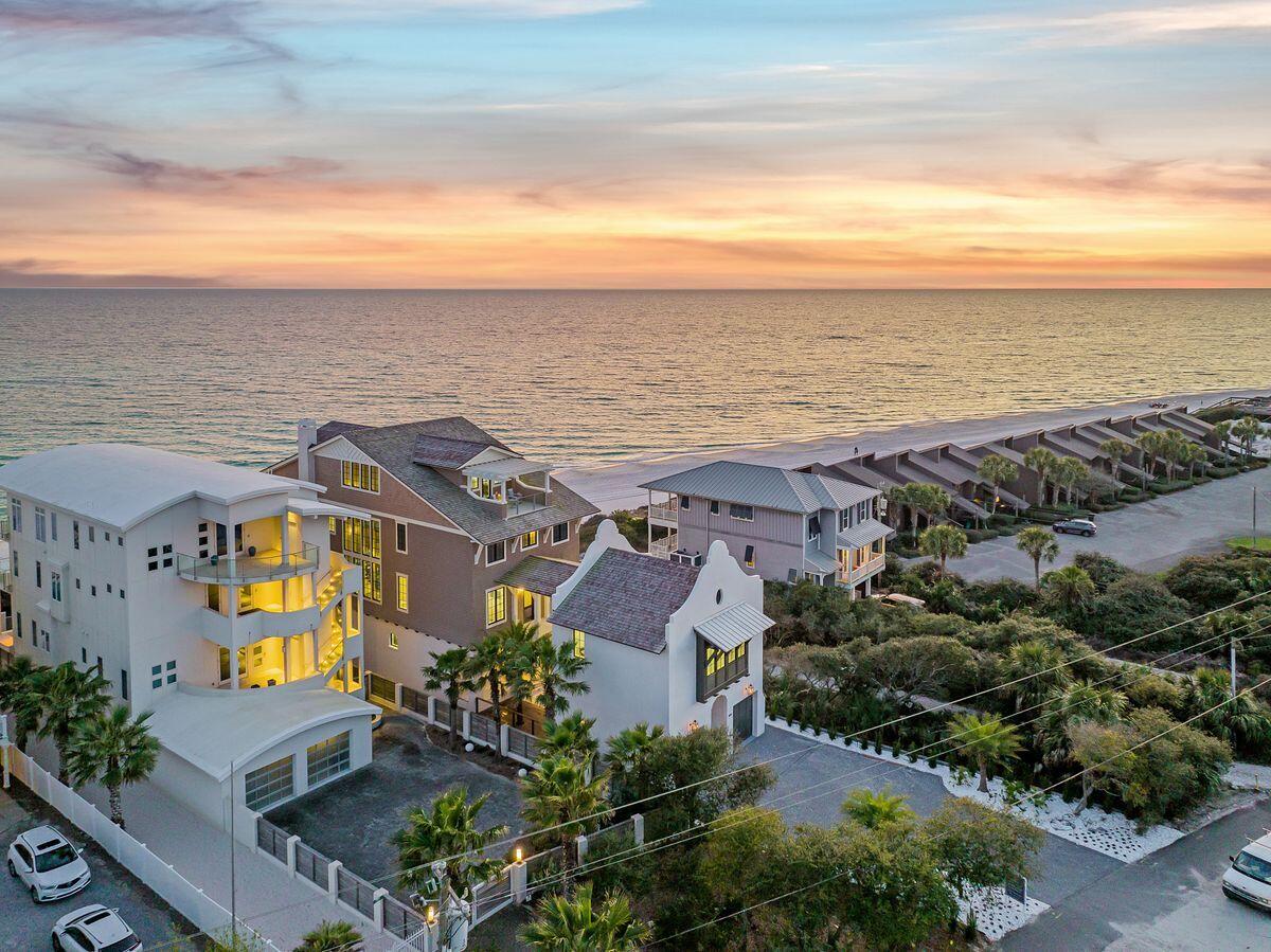 Extraordinary new construction with prolific architectural styling situated on 50' of premium gulf frontage adjacent to Alys Beach and Kaiya in the heart of east 30A. This sprawling compound is characterized by a coastal modern design exceptionally rendered by Chris Stoyles at Archiscapes with interiors curated by Cronk Duch out of West Palm Beach, FL featuring notable upgrades including an impressive four story vertical footprint taking full advantage of unparalleled gulf front vistas as well as a sizable gulf front pool perched at over 30' above sea level offering a optimal privacy and serenity.