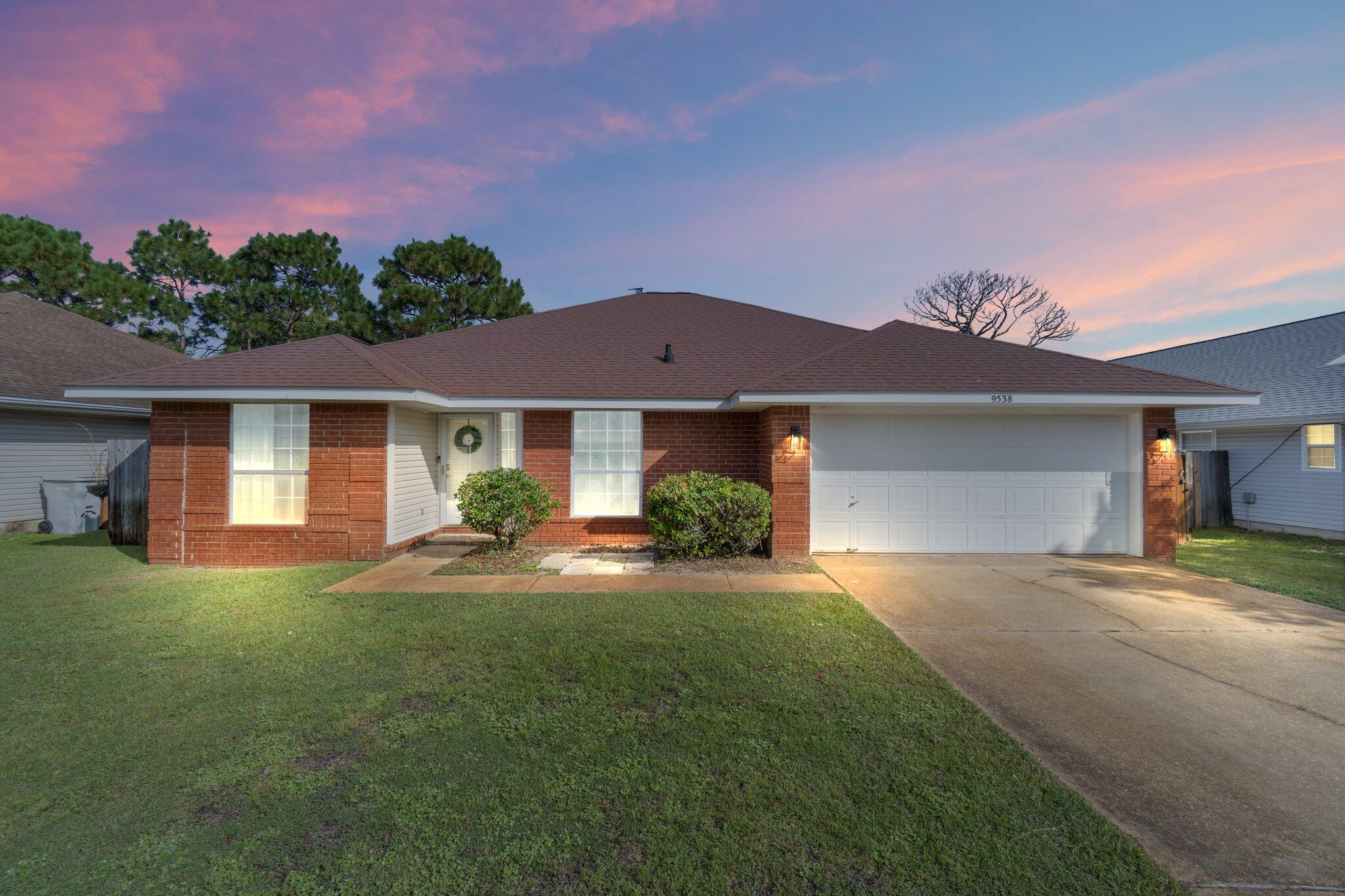 Location location location! Welcome to this charming 4 bedroom, 2 bathroom home located in the highly sought-after East Navarre area! This property boasts a spacious and open floor plan, featuring luxurious vinyl flooring and stunning vaulted ceilings throughout. Recent updates include modern door hardware and contemporary lighting fixtures that add a touch of elegance to the interior.The kitchen showcases gorgeous quartz countertops, a convenient breakfast bar, an island, and stainless steel appliances. You'll appreciate the generously sized pantry and laundry room combo, making household chores a breeze. The primary bedroom offers comfort with a ceiling fan, while the primary bathroom provides a double vanity, two walk-in closets, and a garden tub
