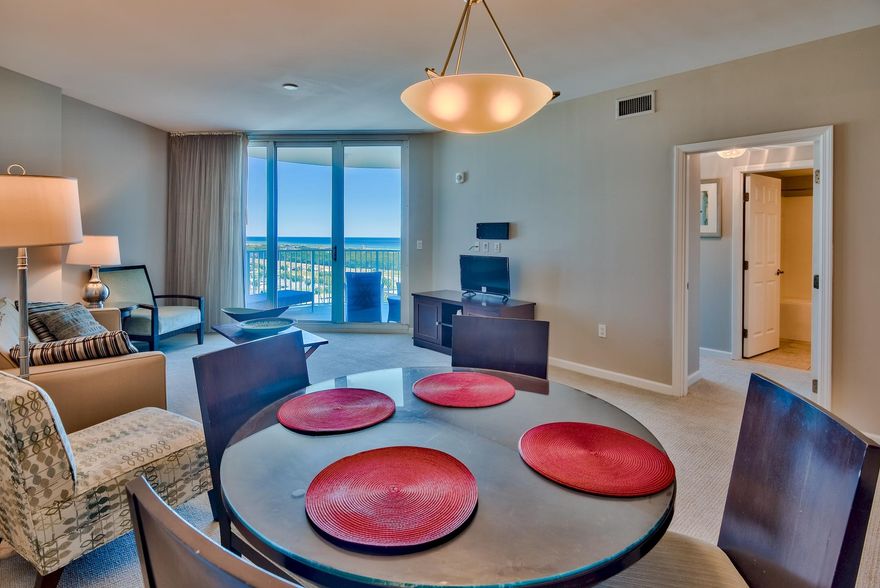 10th floor unit at The Palms of Destin with stunning Gulf and Bay views! RENTAL PROJECTION OF APPROX $32,200 A YEAR! Unit has new carpet and new paint. Kitchen features granite countertops and maple cabinetry. Amenities at The Palms are first class. They include an expansive 11,000 SF lagoon pool with waterfall and spa, children's pool, playground and splash pool, lighted tennis and basketball courts, first class fitness center, seasonal shuttle service to the beach, and covered protected parking. Also on site is the conference center, office center, and reception desk. THE ASSOCIATION FEES INCLUDE ALL UTILITIES, INCLUDING ELECTRICITY, WATER, CABLE, INTERNET, AND LOCAL PHONE SERVICE. Buyer to please verify all information including square footage, room dimensions, and all else.