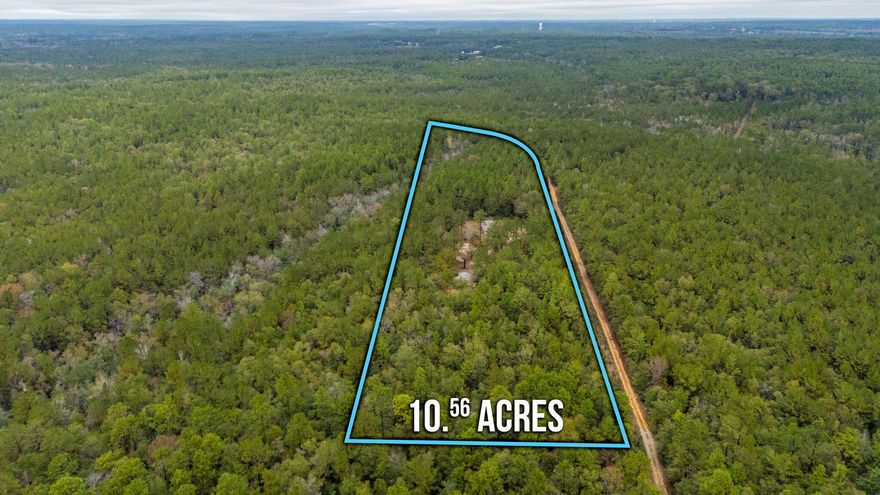 *Professional pics coming soon* Beautiful home on over 10.5 acres - Do you want seclusion in a country setting while still within close proximately to town? Do you have a need or want for a large pole-barn? This home & property might be just what you've been waiting for. This Move-In-Ready 3 bedroom, 2 bathroom home was built in 2022 and sits on a little over 10.5 acres. The kitchen features stainless steel appliances and a large island with plenty of cabinets! Linoleum flooring throughout the main living areas and bathrooms make for an clean flow with carpet in bedrooms for comfort. The main bathroom has a double-vanity with a large walk-in tile shower. The highlight is the stainless steel shower tower that features a rainfall shower head and massaging spray jets. On the opposite end of the home, you can find the other 2 bedrooms and bathroom with shower/tub combo. Outside, the beauty awaits. With a portion of the acreage cleared, there is still a large amount of the land that is wooded to help keep the home in its own little private sector. The pole-barn is located far enough away from the home that while the busy-body is outside piddling, the home-body can enjoy peace and quiet inside without being disturbed. There's not a neighbor in sight and only 1 other home located on this same road. Don't miss your chance to see this one in person! Located south of I-10, this property is still close to town while having an easy drive to Freeport or the south end as well. (this property also has a 2 bedroom, 1 bathroom, 1989 mobile home, that needs lots of TLC. We have given it no value. It needs a lot of attention but could be renovated for a second home).