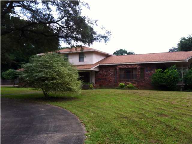 Handy Man special. This property is waiting for someone who can give it a little TLC. This 2800 sq ft home rests on 8.54 acres. The property is fully fenced and perfect for horses. Just off the pasture sits a 4 stall barn with hay loft and tack room. There is an in ground pool, carport, and pool house with bathroom. There is even a dog kennel with water and building. The house has several large rooms and porches all around. There is a huge screened in patio just off of the kitchen that overlooks the pool. The bedrooms are ample size. This home has so much charm and a convenient location. If you are looking for a small farm or room to grow that you can put your own personal touches on this place is for you.