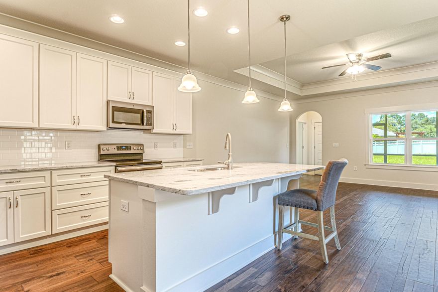 Brand New Construction in Niceville with a top local builder! 4 bedrooms 2.5 baths with all the upgrades you are looking for! Quartz counters, tile or vinyl flooring, soft close drawers - many selections available for your choosing.These are some of the deepest lots in Niceville and since there is no HOA you can build another structure behind the home. 8 foot clearance on the side, perfect for boat storage. Backyard has ample space for a workshop, play space, second garage, or additional parking!This home is located near the Mid Bay Bridge for easy access to/from Destin and all 3 local military bases!**Home to be built, photos are of another home** Lot Size is approximate (50 x 250)