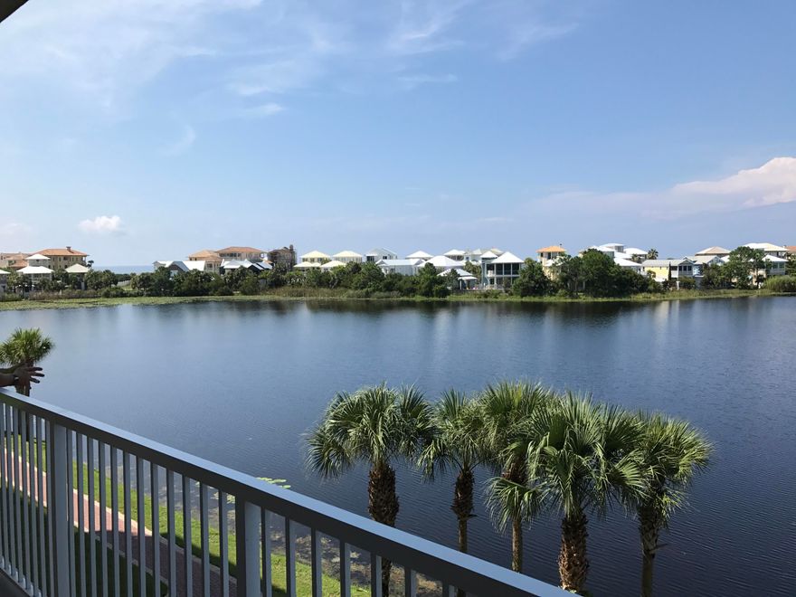 Must see luxury condominium on third floor of sunset building, overlooking Lake Carillon and Gulf OF Mexico. This 3 bedroom 3.5 bathroom condo boasts a gourmet kitchen with ice machine, a wine cooler, a warming drawer, dishwasher, Monogram refrigerator/ freezer, and a large 6 burner gas wolf range.Master bath has large tub steam shower and double vanity. Large guest bathrooms. Selling furnished except for some personal items.