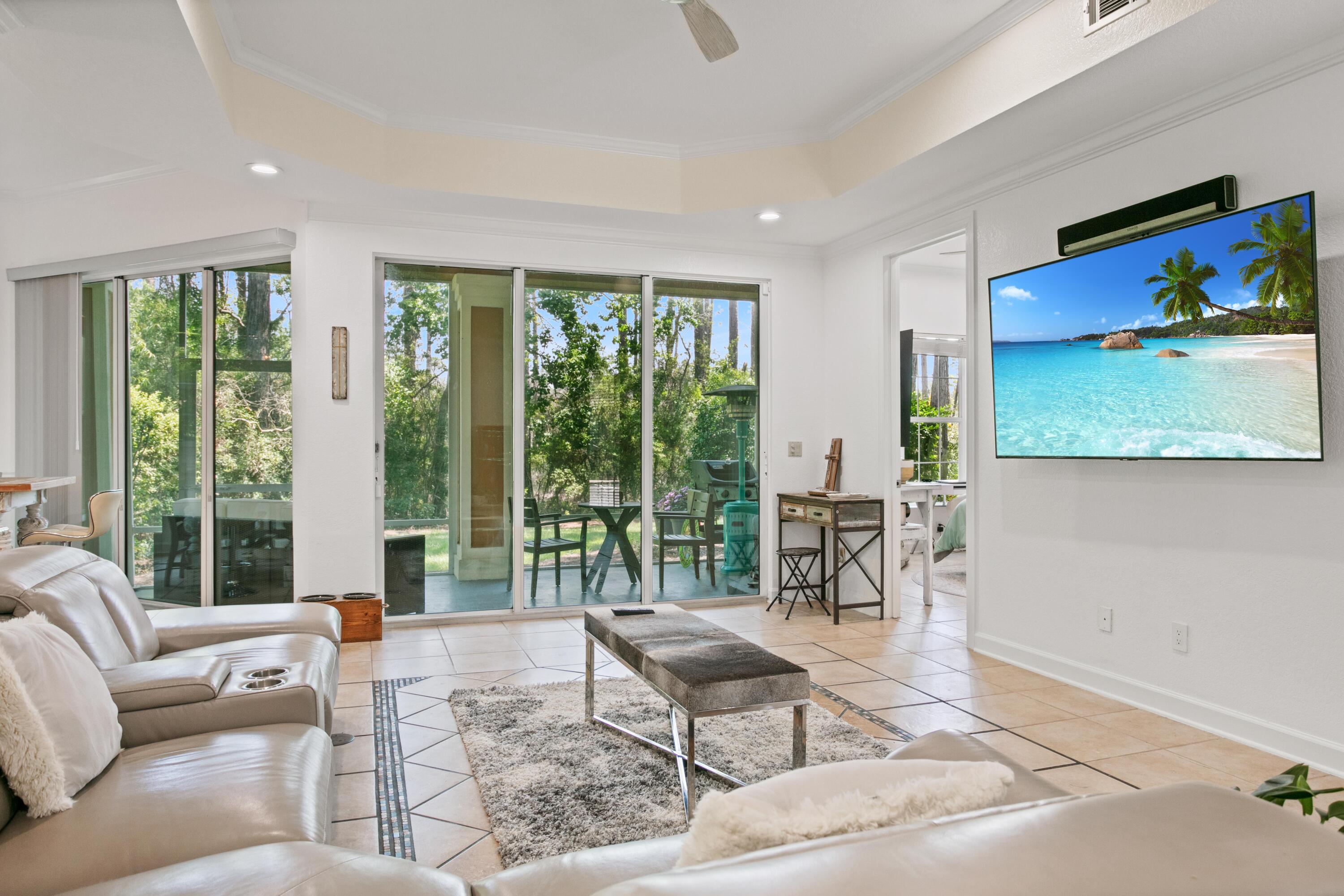 Welcome to 2332 Crystal Cove Ln, a ground floor condo nestled within the beautiful Sandestin Golf and Beach Resort. This lovely home boasts a tranquil atmosphere, making it the perfect retreat for relaxation and enjoyment.This condo features freshly painted interiors that exude a clean and modern feel, complemented by upgraded light fixtures and ceiling fans, adding a touch of elegance to the space. The brand new appliances in the kitchen offer both convenience and style, making meal preparation a pleasure. Located in the peaceful Crystal Cove neighborhood, away from the hustle and bustle, you'll find yourself immersed in the serene and tranquil surroundings. Step outside to the newly screened-in porch and enjoy your morning coffee while listening to the sounds of nature.