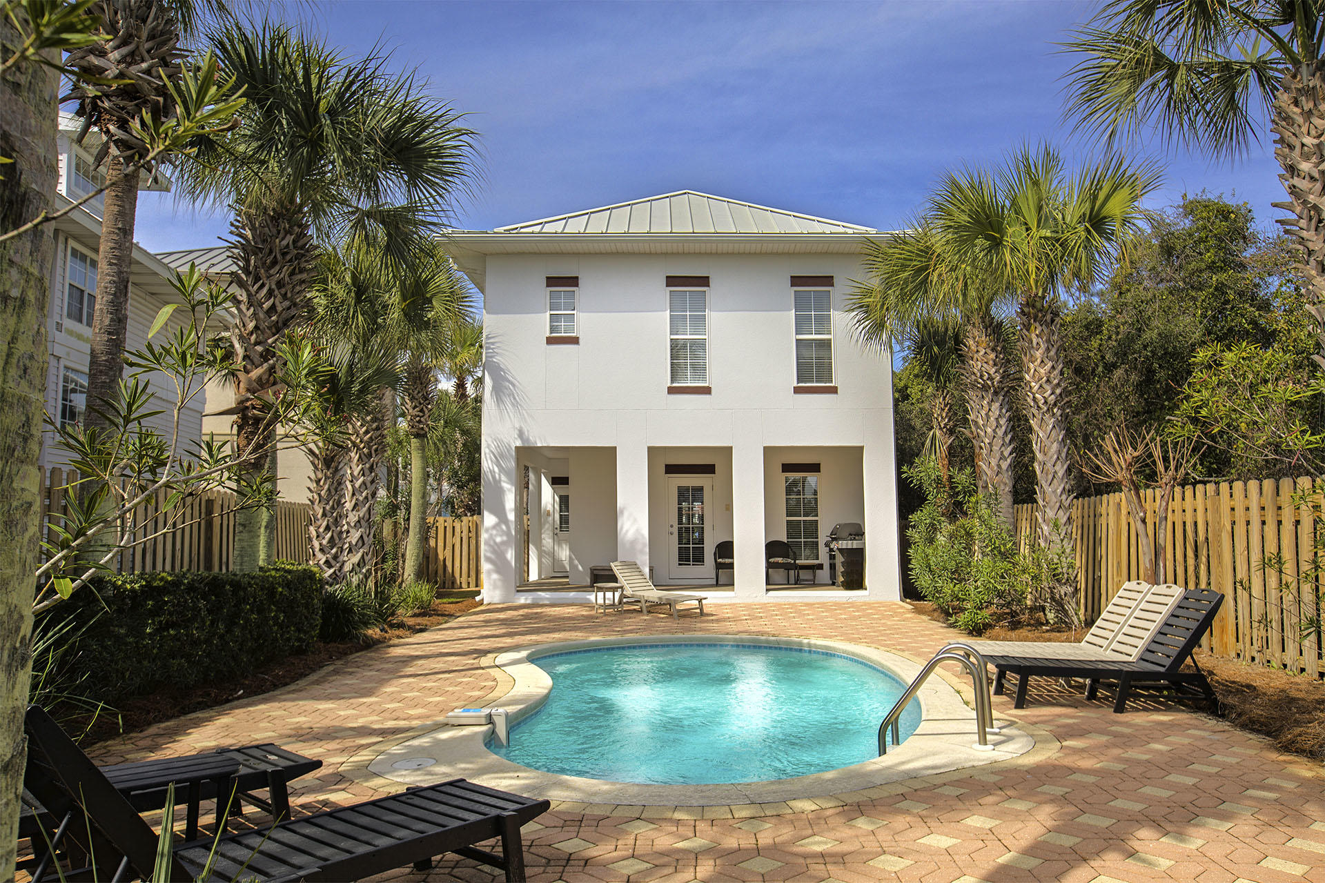 ''Frangista Retreat'' - This inviting home is located on one of the largest lots in Frangista Beach and is perfectly positioned just a short distance from the deeded beach access for the community. The home is located just two lots back from Scenic Highway 98. Because the lot is larger than most, the lagoon style pool, and large paver pool deck in the back yard stand out from most other comparable homes in Frangista Beach.As you enter the first floor, you are greeted by the open great room containing the living, dining and kitchen portions of the home and many windows offering bright natural light. The open, state of the art kitchen boasts all stainless steel appliances, custom cabinetry, and granite counter tops. Two guest bedrooms with a shared bathroom complete the first floor.