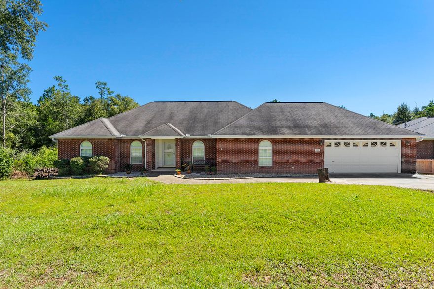 DON'T MISS THIS BEAUTIFUL HOME IN CRESTVIEW!! This property has been updated with new flooring and fresh paint throughout the home. The kitchen features a breakfast bar, pantry, and double oven. The master bedroom features trey ceilings with fan, access to the open deck via double French doors and a fully updated ensuite. The master bathroom has been upgraded with a freestanding, soaking tub, porcelain tile shower (glass to be installed) and flooring and new light fixtures. The two additional bedrooms and bathroom offer an abundance of space for the family. Spend your days outside on the covered screened in porch or on the open deck soaking in the sun. Schedule your showing today and let us welcome you home!