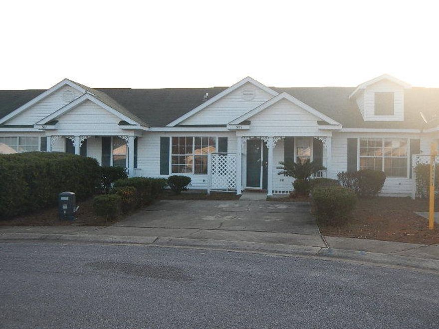 This charming interior villa in Springfield offers a pretty covered porch, parking pad, and backyard that is fuly privacy fenced and features an open patio-perfect for entertaining! Inside you'll find a greatroom layout that includes a living/dining combo, vaulted ceiling, plant ledges, kitchen w/breakfast bar, laundry closet, and two cozy bedrooms! Located right off of Blue Angel Pkwy., this home offers super easy access to Mobile Hwy. so you can easily commute to Seminole, AL or downtown Pensacola! Plus Bellview Middle & Pine Forest High are just a few short blocks away!