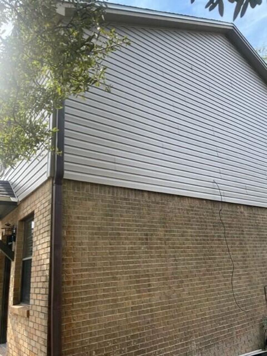 NEW ROOF! PRICE REDUCTION! New Vinyl Siding on Front and Right Side. New LVP flooring in Kitchen, Laundry and Additional Bathroom Downstairs. No HOA. 2 Bedrooms and a Full Bath Upstairs.  Large Side and Back Yard - Should be Cut Back This Week.  Bring your Buyers! Pictures Coming Soon. Buyer to verify all measurements and pertinent information.