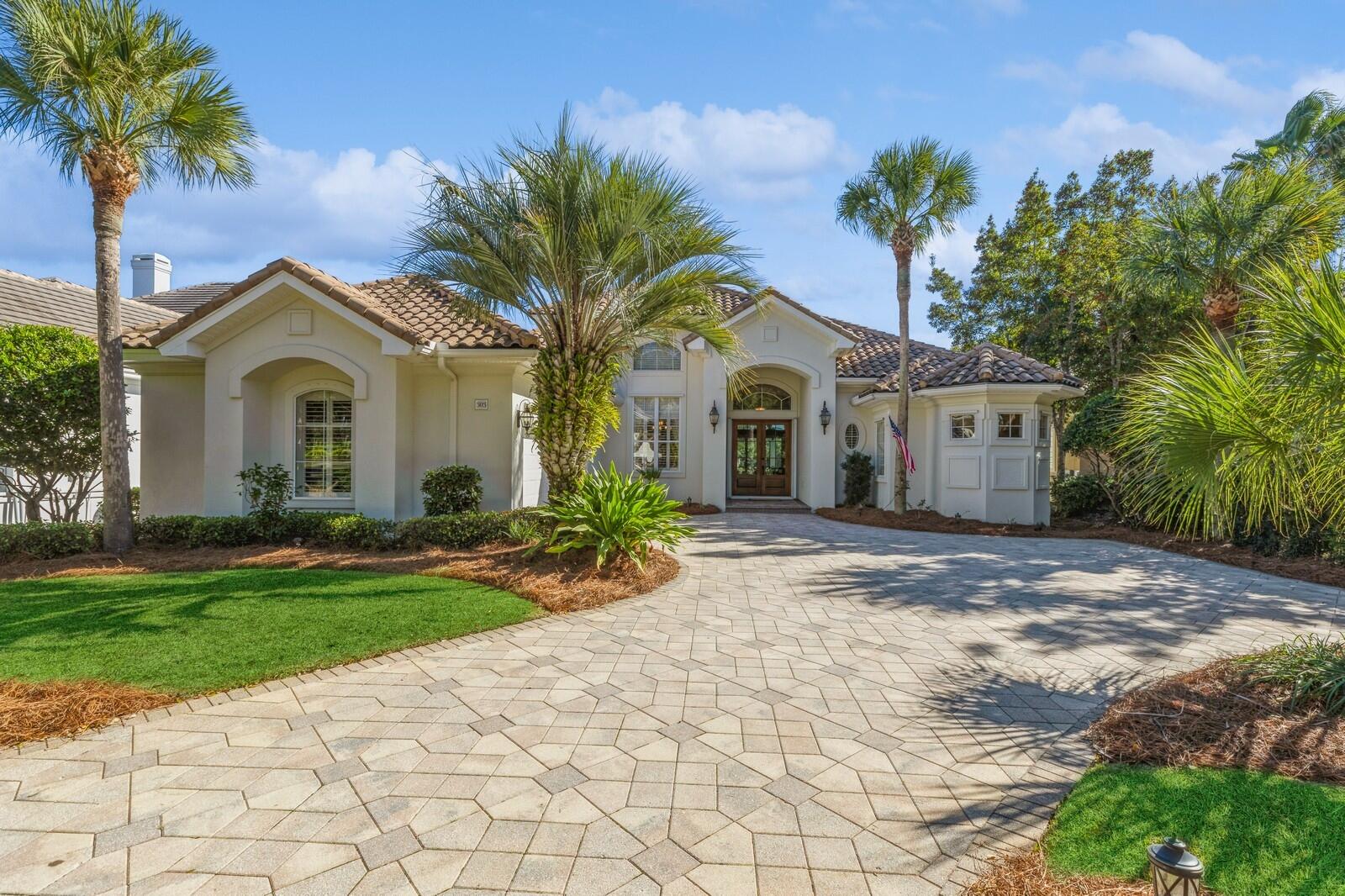 Stunning custom home within the award-winning gated, golf community of Regatta Bay! PREMIER LOCATION on the 15th fairway with panoramic golf course and lake views. Just one block from the back gate makes for quick access to Hwy 98 or Niceville. Destin Middle School is 1/4 mile from the front door. This luxury home has been updated and meticulously maintained by the owners. Features include HUGE screened in pool/spa area with outdoor kitchen, second floor bonus room with large balcony overlooking golf course, two master suites with double vanities and walk in showers, open floor plan with granite countertops, custom cabinetry, tray ceilings, and fenced yard. Open kitchen concept includes cafe nook and gathering room. Home Office can be converted into another bedroom. Seller is willing to offer the property fully furnished. Imagine being able to take your golf cart to Lulu's, the Marina, or go shopping and dining at the Commons. White sandy beaches are within a mile. Buyer to verify all fees and dimensions. Home warranty included. 