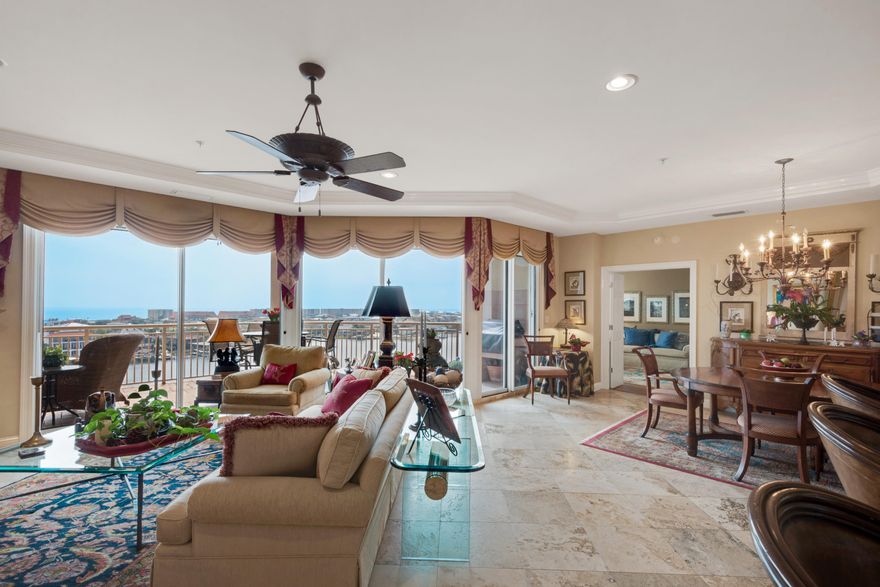 Beautifully appointed residence for the discriminating buyer with a private entrance, and an open floor plan with floor to ceiling windows in the living room, master bedroom and media room. Unit includes 70' Boat Slip( #8) . Captivating views of the harbor and gulf from the foyer, master bedroom, living room, dining area kitchen and media room Four bedrooms all with wood flooring have private baths and plantation shutters. Travertine flooring is in all other areas except the bedrooms. Granite counters are in kit., including the kit bar area which is surrounded with both travertine and granite tile.More...