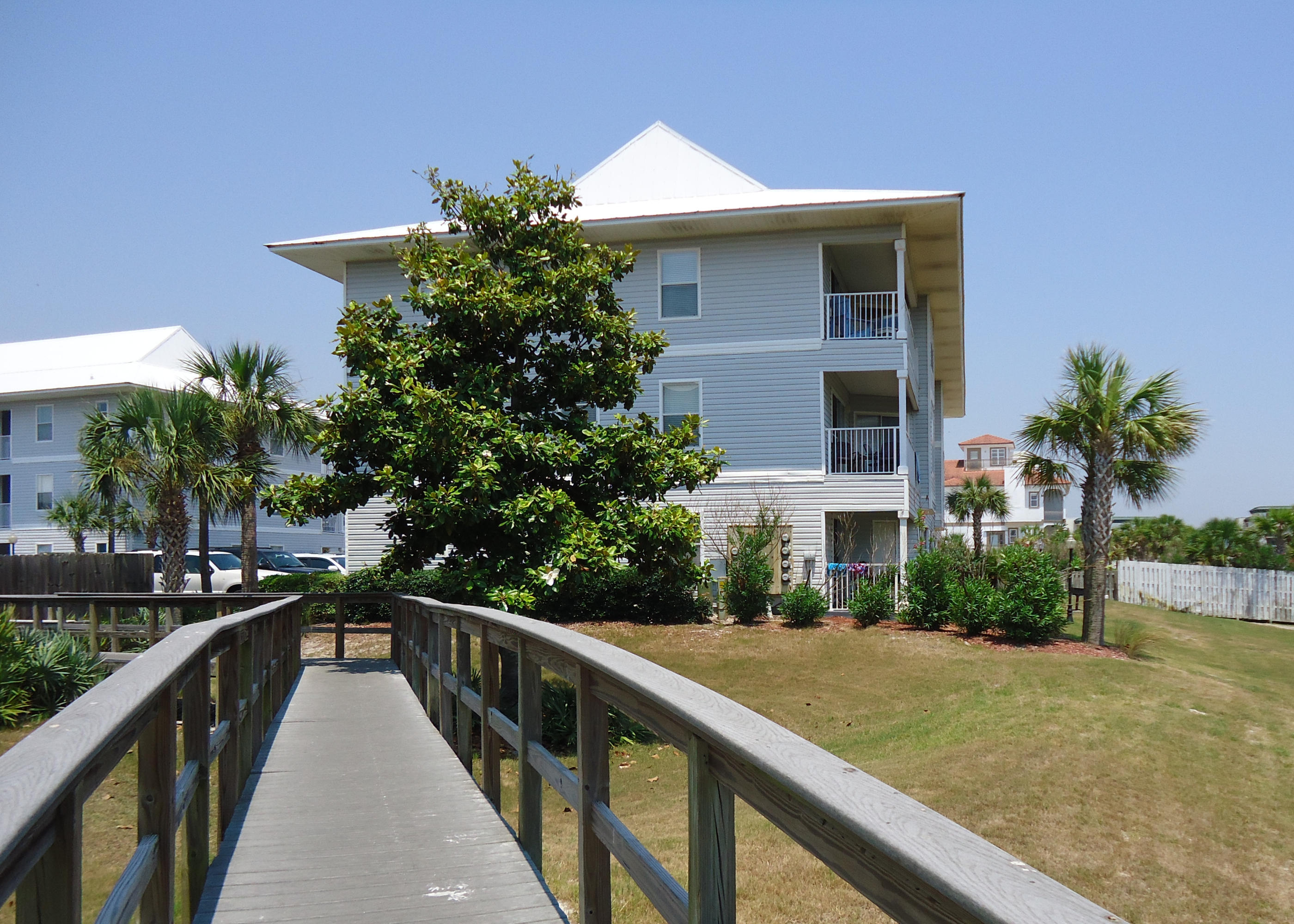 Just steps to the beach! You won't find anything on 30A this close to the beach for this price! This ground floor condo in popular Beachside Villas features 2 bedrooms and 2 full baths with walk-in closets. The full kitchen with all appliances features a spacious breakfast bar. Nice living area with flat screen TV has sliders to the covered patio. Stackable washer/dryer is included along with all furnishings for your convenience. Community features include: boardwalk to the beach, tennis courts, 2 swimming pools, picnic area, and fishing dock on the lake. Great location in Seagrove between WaterSound and Seaside. Call today!
