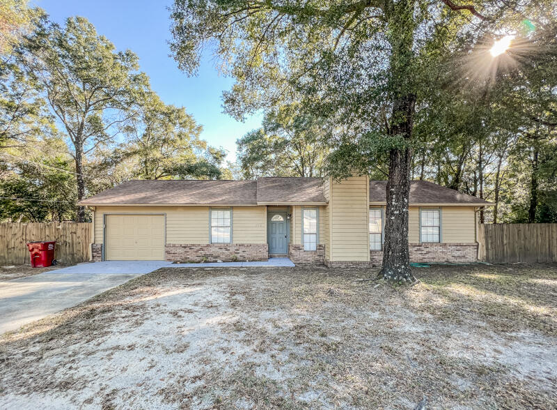 Available NOW....3/2 with easy commute to bases, beaches, & shopping. Large lot features a 1 car garage, privacy fenced back yard with yard building. Wood burning fireplace, breakfast bar, galley kitchen and large laundry. Newer paint throughout the home. Clean and affordable. No inside smoking or vaping. Pets will be allowed with a $400 non-refundable pet fee and owner approval.