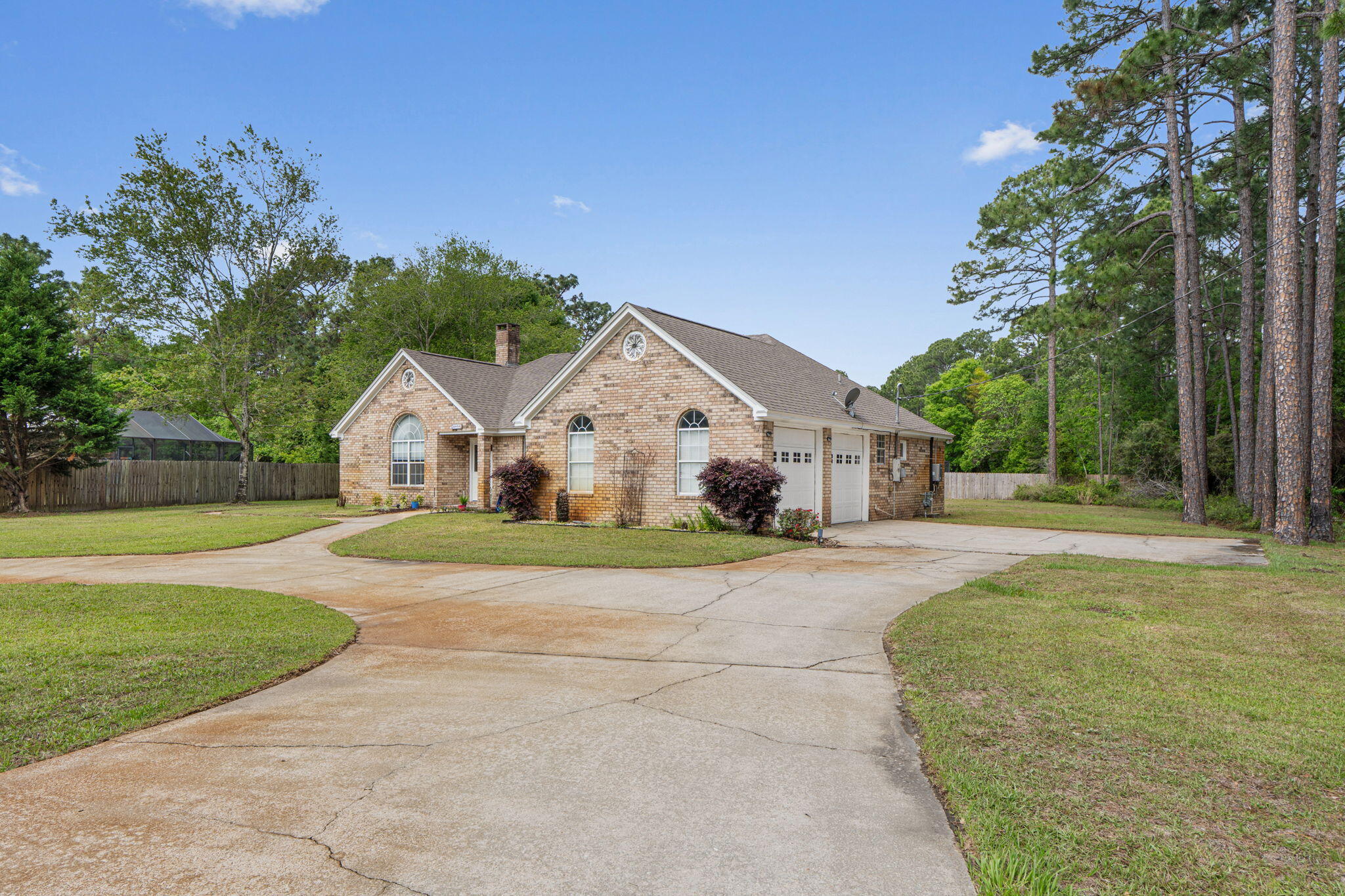 Welcome to your private oasis in Navarre's highly sought-after neighborhood of Holley by the Sea! This 3 bed, 2 bath custom-built home sits on a .62-acre cul-de-sac lot neighboring protected green space offering peace, privacy, & room to breathe. Enjoy the Florida lifestyle year-round from your spacious screened porch, overlooking the large backyard with plenty of space to get creative! Inside, you'll find custom cabinetry throughout, fresh paint, and recent upgrades roof (4 yrs), AC (2 yrs), and tankless water heater (2 yrs). Lg garage w/ extra cabinets.As part of Holley by the Sea, you'll have access to a top-tier recreation center with pools, fitness facilities, tennis courts, and more. Don't miss this rare combination of location, privacy, & upgrades. Schedule your showing today!