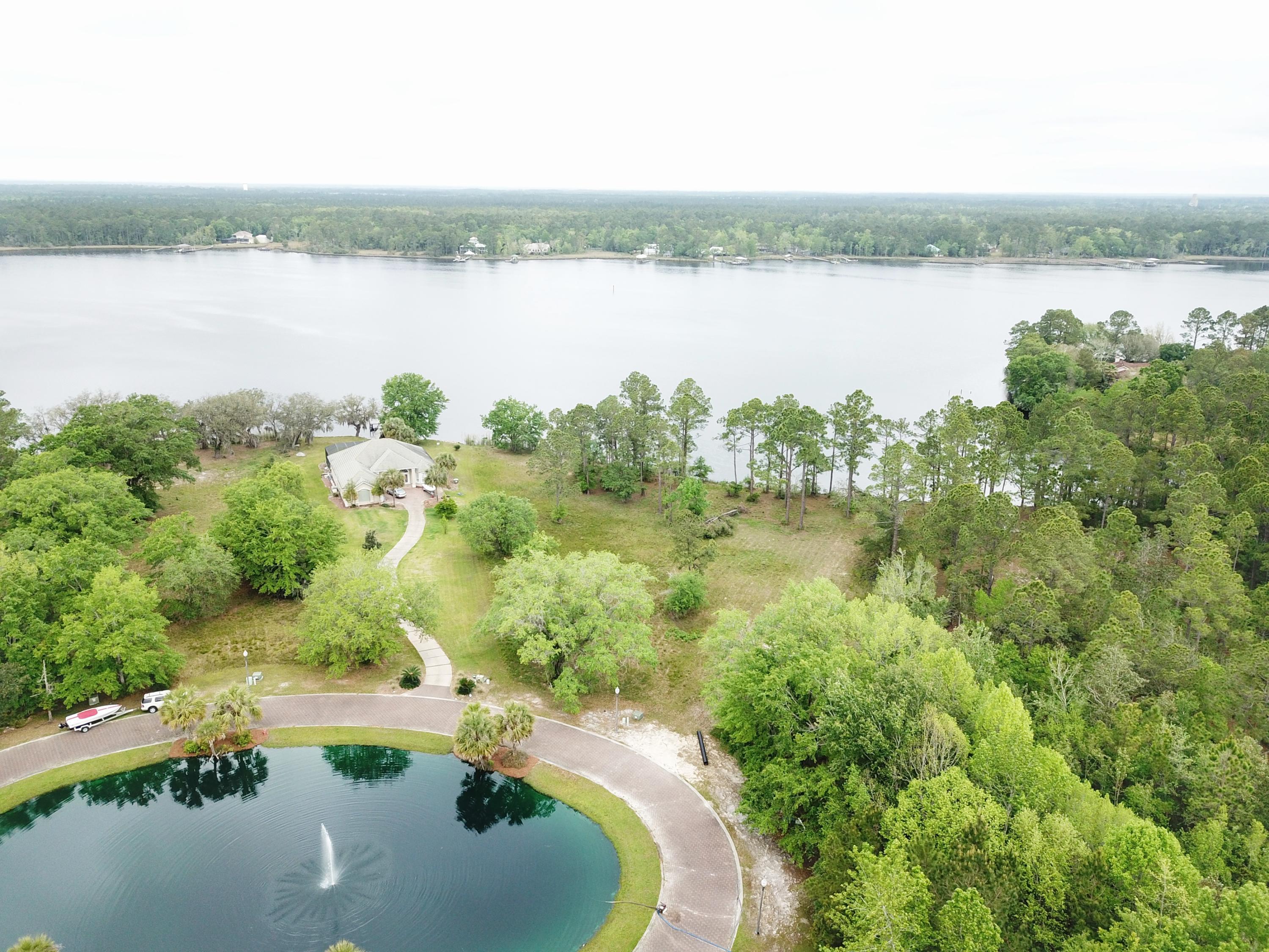 Boaters Paradise! This half acre home site, located in the 12-lot gated community of Lagrange Cove, offers 86 ft of shoreline on Lagrange Bayou, a true deep water bayou. Full service marina is located less than a mile to the north up Lagrange Bayou, for all your boaters needs, complete with marina store. Boat over to The Bay restaurant to enjoy bayfront dining in South Walton. Restaurants, shops, and Publix grocery store also located less than 3 miles away. Build your custom home and take advantage of the open waterfront views of Lagrange Bayou. Neighborhood boasts central water feature, privacy fence with gate and 12 waterfront lots. Lot 8 faces north so boat dock should be better protected by land from major storms. This property is truly a rare find which you need to see in person.