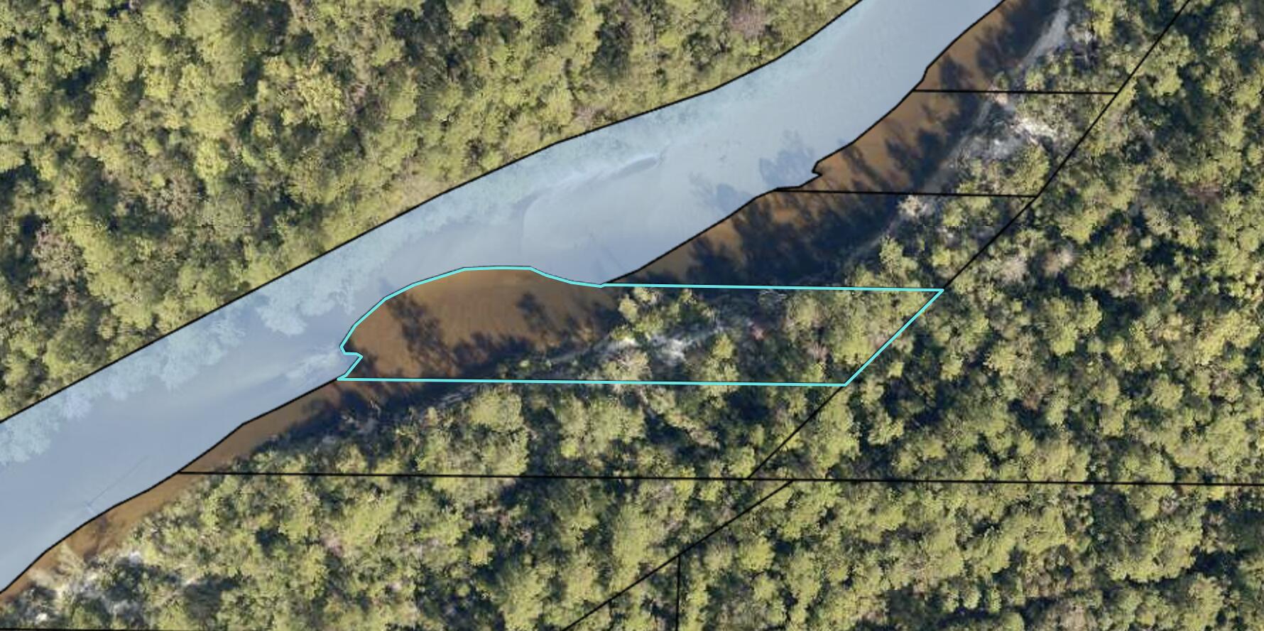 Riverfront property! Set up your fishing camp just minutes from town. Bring the family and enjoy nature at it's finest. This is one of three adjoining lots for sale.