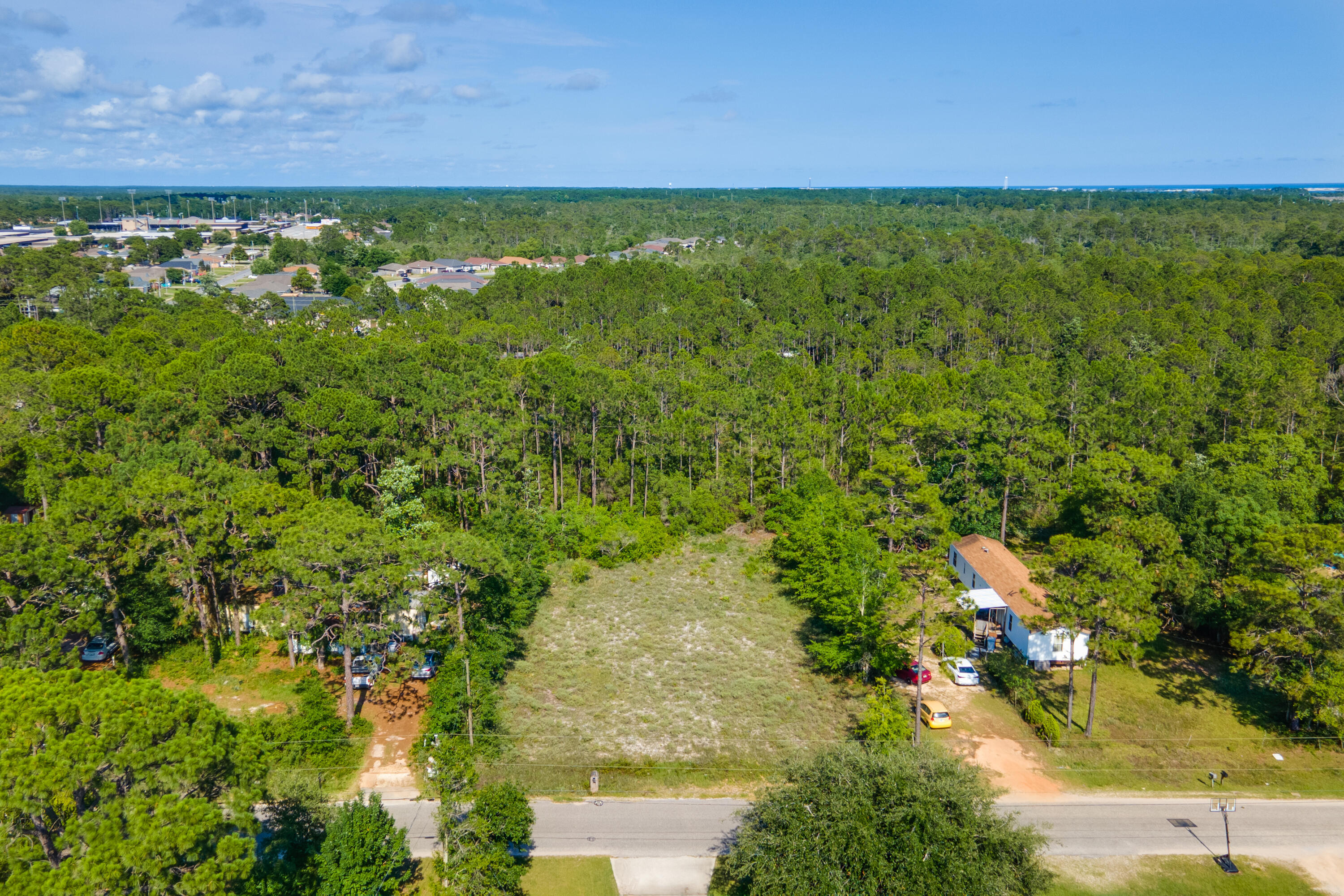 This lot is high, dry, cleared and ready to build! Build your dream home in beautiful Navarre! Minutes to white sand beaches, shopping, restaurants and amenities.