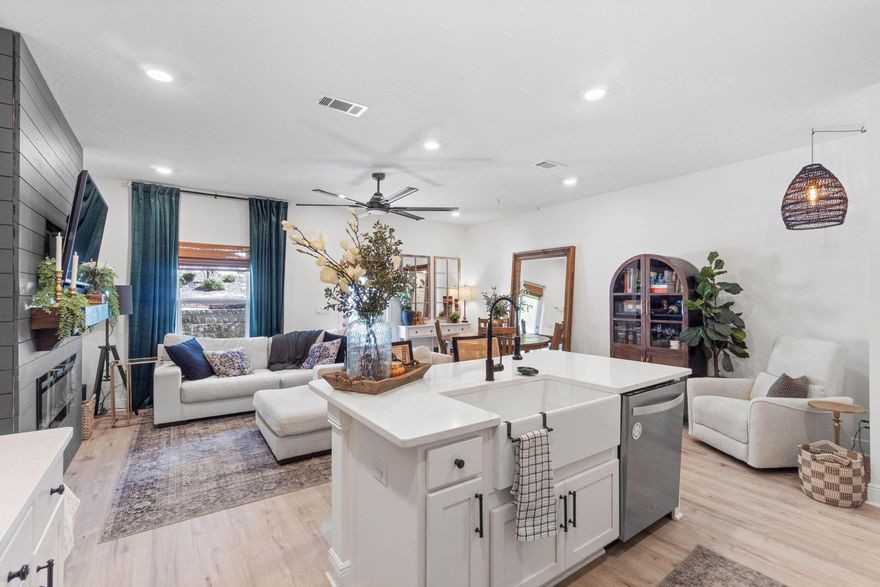 Experience coastal living at its finest in this exceptional 3-bedroom townhome.&#8232; While many nearby towns boast about proximity to Destin beaches, locals know the real secret: being right in West Destin puts you in the heart of everything that makes this area so special. Under a mile from coffee shops, dining, playgrounds, HarborWalk Village, and local breweries...you're minutes from a handcrafted latte, sunsets by the harbor, or good times with friends.The main level of the home serves as your entertainment hub, with an open layout, well-appointed kitchen, half bath, and seamless access to a covered back porch. Upstairs, your peaceful retreat awaits. All bedrooms are thoughtfully separated from the main living spaces. The primary bedroom features a spa-inspired ensuite with gorgeous tiled walk-in shower, double vanities, and generous closet space. Two additional bedrooms and a third full bathroom complete the second floor. Durable luxury vinyl plank flooring throughout means no carpet maintenance. 

The sellers have enhanced this 2023-built home with thoughtful upgrades, including:
- A custom fireplace feature wall with shiplap paneling, hearth, electric fireplace, and universal TV mount
- Updated half bath with new molding and paint
- New lighted ceiling fans throughout
- Upgraded kitchen sink and faucet with built-in bottle and glass cleaner
- DEAKO light switch dimmers
- Enhanced front yard landscaping with gutter downspout piping, gravel, and mulch

Unlike most units in Harbor Place, 32 Redbird offers a double driveway, plus ample guest parking.

Located in Flood Zone X, no flood insurance is required by the lender.

This is simply the finest home available in Destin in the $400,000 range; newer construction, premium finishes, unbeatable location, and practical features. 

Don't just visit Destin. Live here!