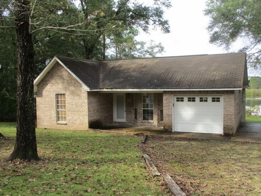 Located on Gorgeous King Lake, this All Brick REO home is one to see. Built in 1999, this split bedroom design home has 3 bedrooms 2 baths, 1 car garage and rests not only on Kings Lake but also just over 1/2 acre. One certainly could not build this home at this price or in this location and with some updating and TLC this would be a fantastic place to call home. Home is eligible for FHA financing with Escrows. Call today! (IE) $1200
