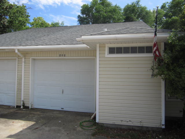 Spacious duplex. New Carpet in the Bedrooms, Tile throughout the living areas. Fresh paint including the ceilings.1 car garage. Washer and dryer connections are in the garage. There is more room than you can tell from the outside. The kitchen is large with a breakfast bar, good sized living room with a fireplace and 3 bedrooms all ample size . Call to make an appointment to view today. Listing Office associate to accompany all viewings