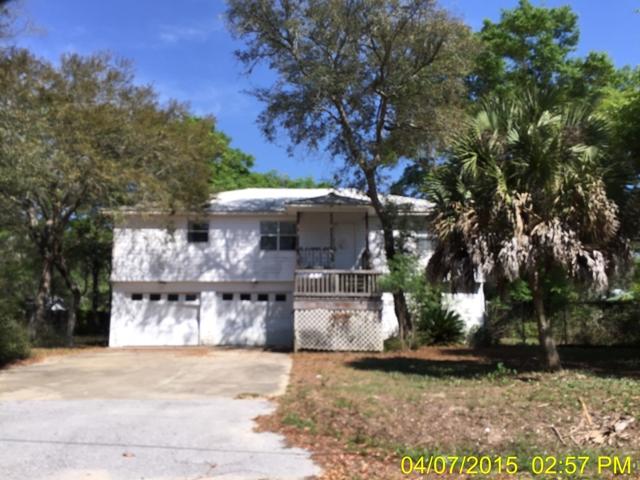 REO... Unique Home on Canal w/ Lots of Potential... This 4 Bd / 3 Ba cottage is situated on a wood lot & offers plenty of space for a growing family. Both the first floor & second floor offer kitchen & living areas. The canal allows water access for small boat. Convenient to shopping, dining, schools & just 10 minutes to the Beach! This property is subject to a 5% buyer's premium pursuant to the Auction Terms & Conditions (minimums may apply).