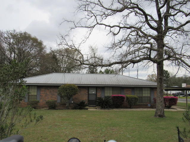 All Brick 3/2 home on 1/2 Acre lot is perfect for those wanting to have a little less to take care of. The entry features a foyer into the private living area. and flows into the eat in kitchen. The laundry room is separate and has a rear entry into the home. Out back you'll find the Florida room overlooking the rear yard with numerous mature plants and shrubs. There are a couple of storage buildings for storing lawn equipment. The roof, HVAC, And water heater have been replace in recent years. Inside needs a little TLC. .