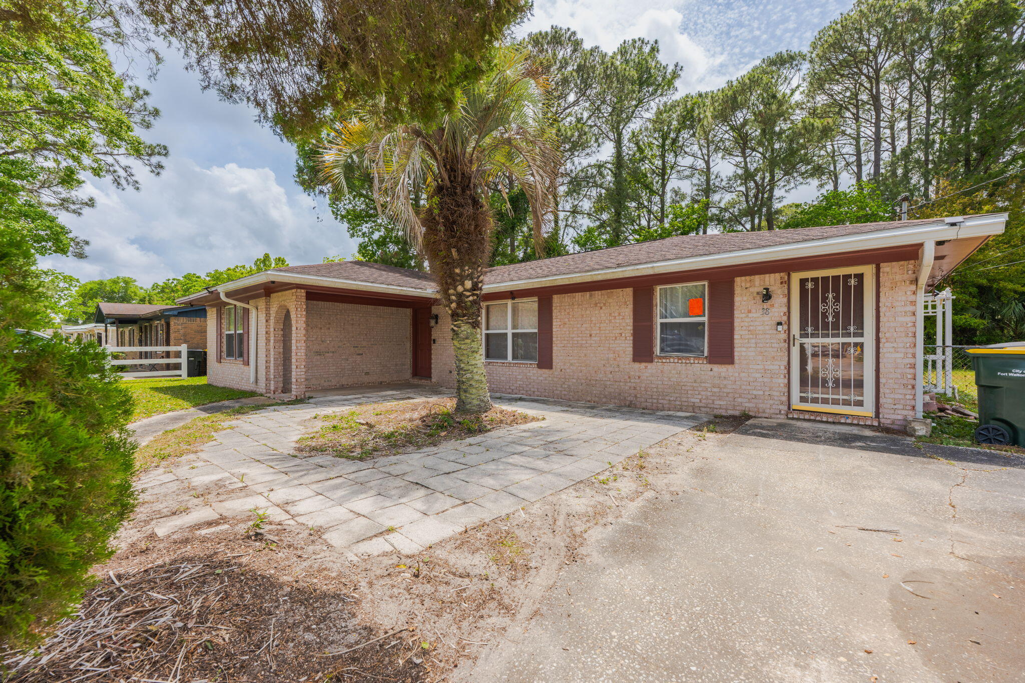 Check out this amazing deal on Deal Avenue! This 3 bedroom/2bath brick home sits on a corner lot in the heart of Fort Walton Beach. Offering two separate living rooms, each with front doors, great for multigenerational living, or a home office. The eat-in kitchen/dining room has a slider to the fenced backyard. The laundry room also has access to the backyard where you'll find a nice shed on a concrete foundation. The windows have been replaced with double pane vinyl windows, but much of the home does need refreshing/some repairs & updates. The corner lot is fenced in back with chain link, and vinyl fencing in the front. Located close to schools & shopping; about 4 miles to Hurlburt Field, about 7 mi. to Eglin Air Force Base, and 4 mi. to the sugar white sandy beaches of Okaloosa Island!