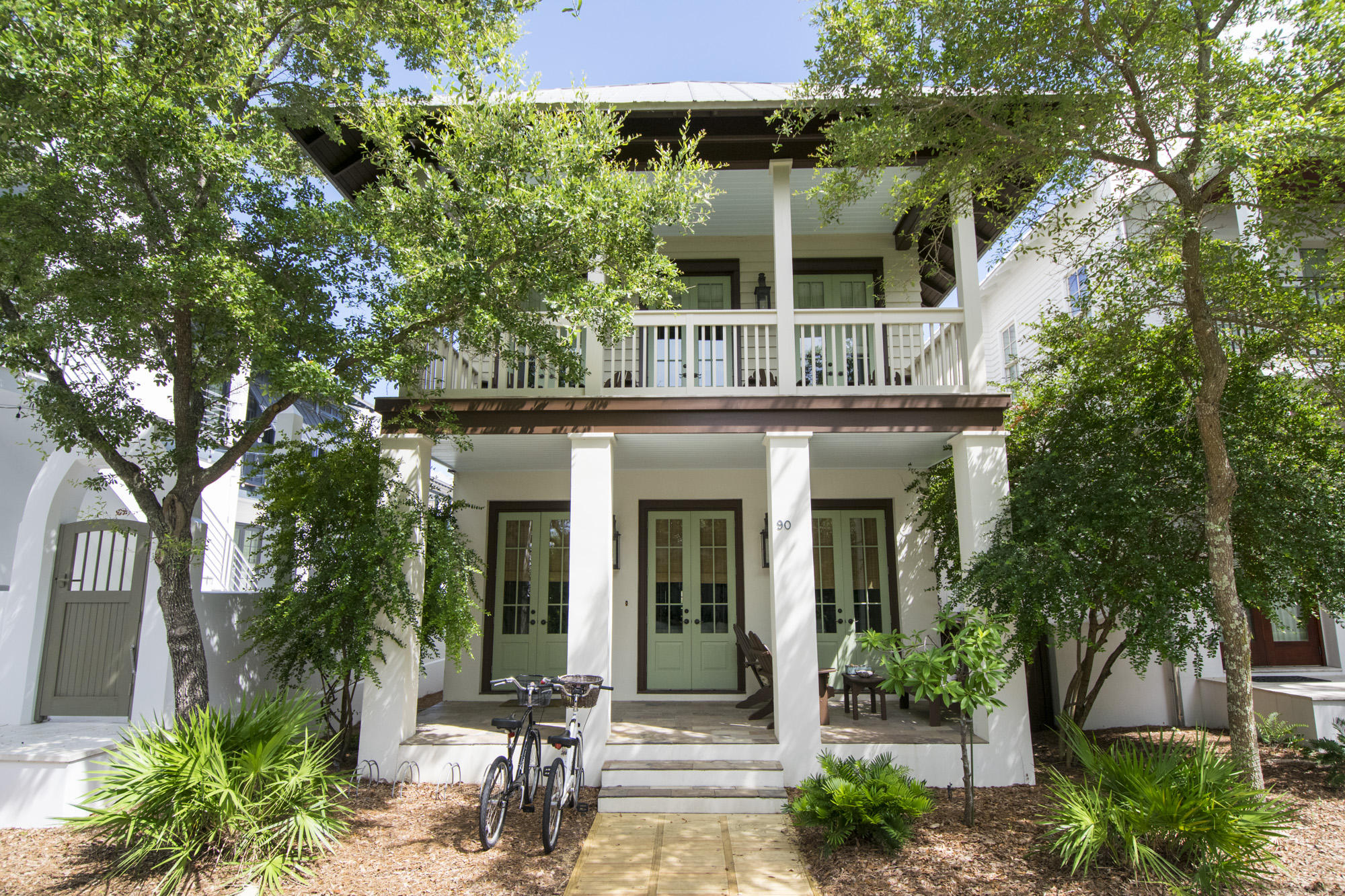 Light and bright, this 3 bedroom PLUS bunkroom, 3 bath home welcomes you with designer finishes and large rooms perfect for beach living. Designed by architect Tom Christ, this NEVER RENTED home features..Hardwood floors throughout, 10 ft ceilings, spacious living area, an especially large master bedroom with vaulted ceiling, and an open concept kitchen with Carrara countertops. The master bath features dual vanities, marble countertops, garden tub, large closet and linen closet. A pantry, large closets and storage and full laundry room make for comfortable, easy living. House is in great condition (Fresh exterior trim paint November 2015) and is being sold furnished. The lot is approved for the addition of a 1 car garage with carriage house. This wonderfully situated home is steps fro