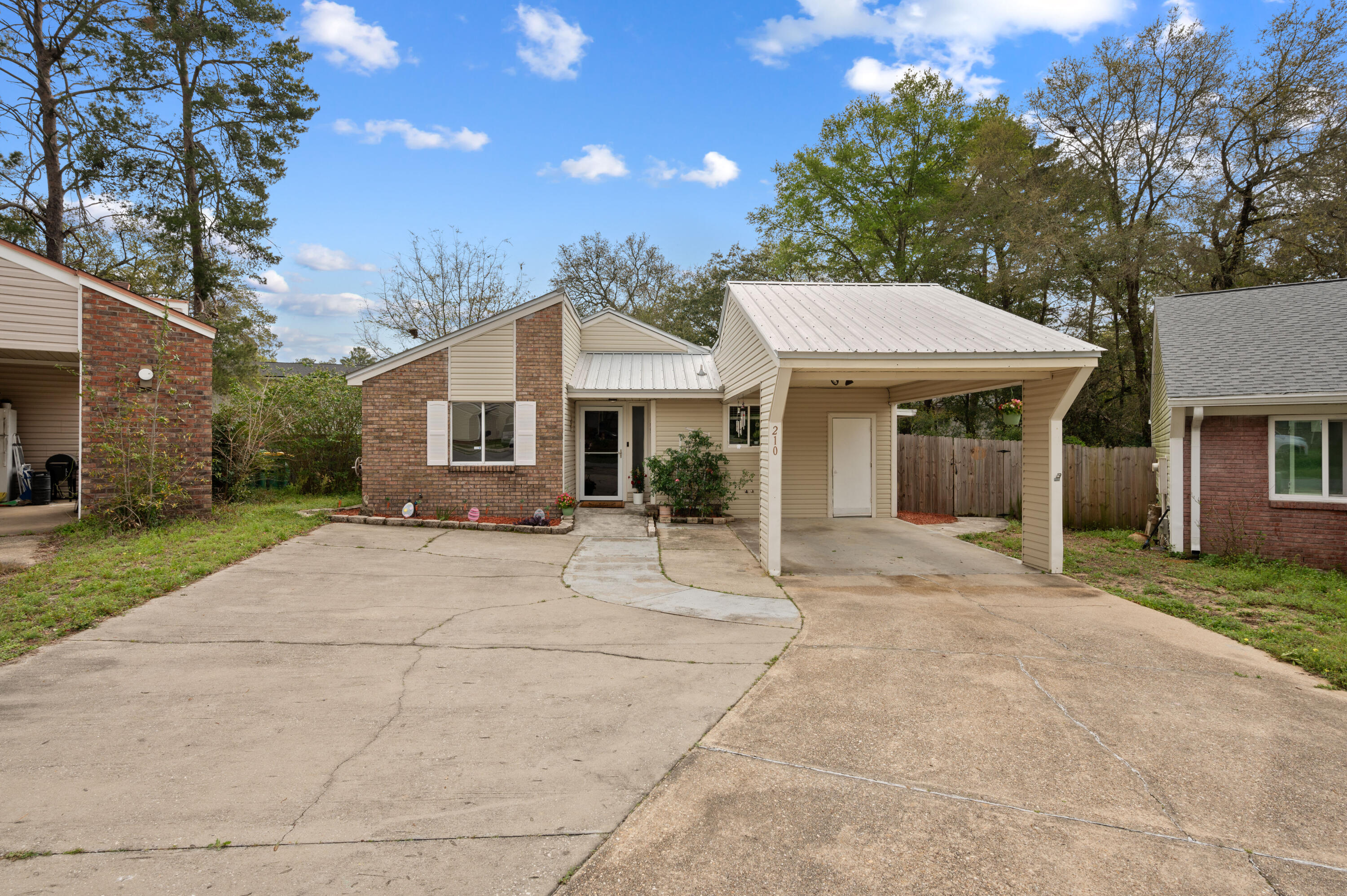 Move in ready! Well maintained 2 bed 1 bath, just minutes from Schools, restaurants, Northwest Florida State College, and Eglin AFB. Open living/dining combo. The kitchen also features plenty of cabinet space as well as a 6x6 walk in pantry! The bathroom has been recently updated. This property also contains an 11 x 16 enclosed sun room that makes its way outside to a large deck inside the fully fenced back yard. The backyard also contains a 16x16 workshop! Come check out this property today!
