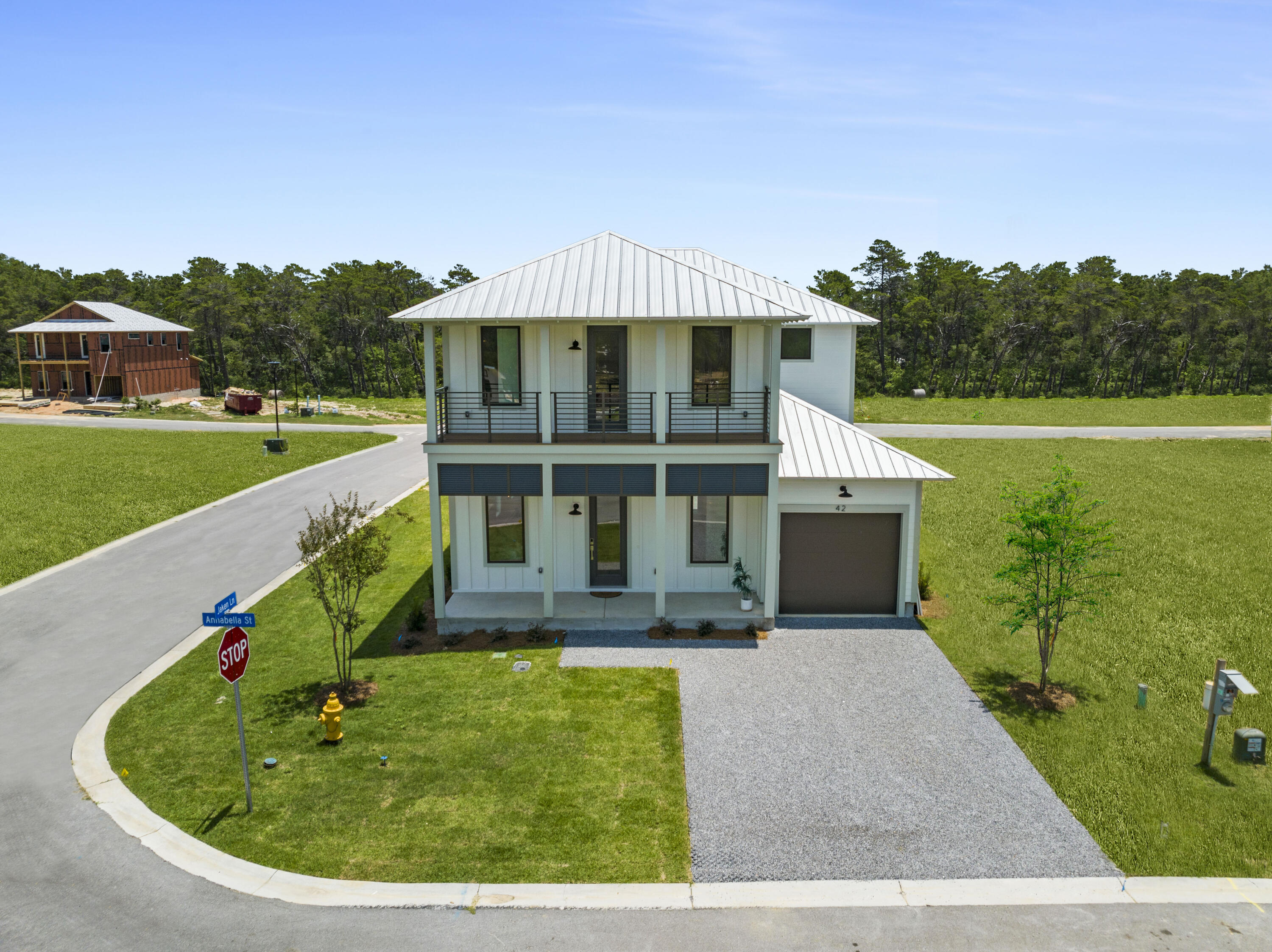 **Ask us about our rates as low as 5.75% with the use of a preferred lender. Rate based on credit score and property type. Other terms and conditions apply.** Also, ask about the $23,000 in upgrades included in this home at no additional cost! 'Furniture currently in this home will convey. A few items have been removed so please contact the agent for more info. Welcome to Wildwood at Inlet Beach, which is the perfect blend of modern aesthetic and beachside charm. This brand new coastal community by Bluscape Homes, is sure to impress!