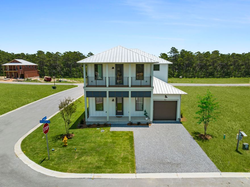 **Ask us about our rates as low as 5.75% with the use of a preferred lender. Rate based on credit score and property type. Other terms and conditions apply.** Also, ask about the $23,000 in upgrades included in this home at no additional cost! 'Furniture currently in this home will convey. A few items have been removed so please contact the agent for more info. Welcome to Wildwood at Inlet Beach, which is the perfect blend of modern aesthetic and beachside charm.  This brand new coastal community by Bluscape Homes, is sure to impress!