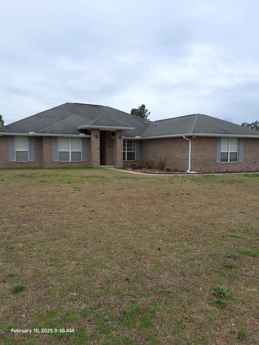 Beautiful 4 bedroom, 2 bath home on half an acre lot~ Split bedroom, with formal living room and dining room~ Kitchen has stainless steel appliances. with tile flooring and breakfast room~ Master bath has double vanity, garden tub and separate shower~  Then you go outside to a large screened in area with a gunite pool, sitting area and a 7 x 7 hot tub~ If this isn't enough it also boast of a 40x24 motor home carport, firepit, swing set, and BarBQ cover~ Seller will have new roof installed prior to closing with acceptable offer~