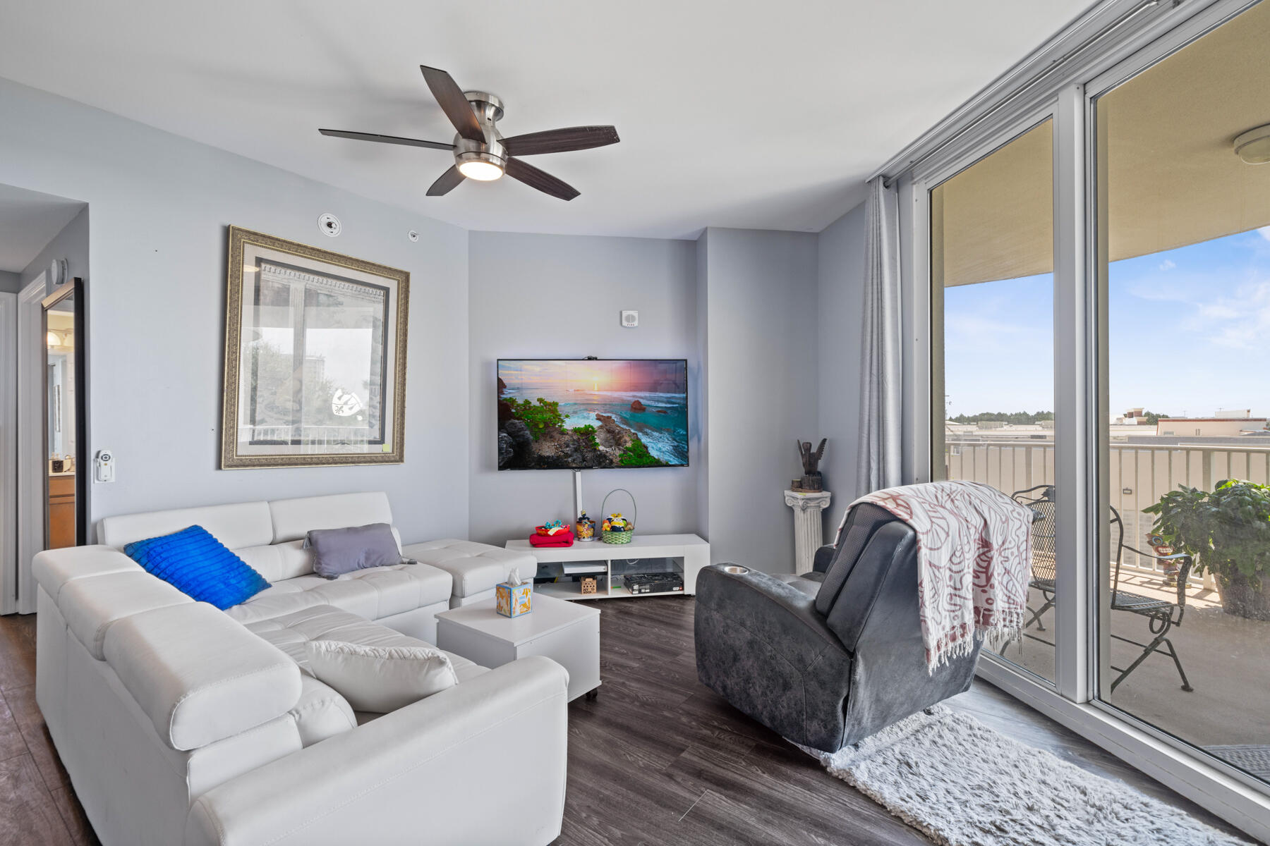 **Highly motivated seller - bring us an offer in time for your summer resort-style living!**Welcome to The Palms of Destin, where comfort and convenience come together. This furnished (with exclusions) third-floor condo features two bedrooms, two bathrooms, and two private balconies. The open floor plan includes a modern kitchen with granite countertops and a breakfast bar, flowing into a spacious living area with balcony access. The primary suite offers an en-suite bathroom and access to the main balcony, while the guest bedroom includes its own private balcony and easy access to the second full bathroom. Residents enjoy a variety of resort-style amenities, including a lagoon-style pool with waterfalls, a hot tub, and a children's splash area. Conveniently located near Destin's beautiful beaches, shopping, and dining.