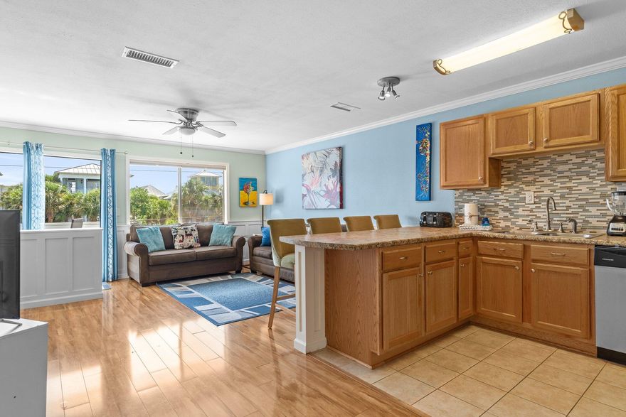 Your Beachside Escape Awaits!  Located in the heart of Holiday Isle, this charming turn-key studio is just steps away from not one--but two deeded beach access points, Norriego Point, O'Steen Beach, and the East Pass with the iconic Destin Jetties. Whether you're soaking up the sun or exploring the water by kayak, paddleboard, or water taxi, this location puts you in the center of it all.Inside this 550 sq ft coastal retreat, you'll find a thoughtfully designed studio that maximizes every inch of space. A custom Murphy bed and pull-out sofa allow for flexible living arrangements without sacrificing comfort or style. The open-concept kitchen features a breakfast bar, stainless steel appliances, and everything you need to whip up a post-beach meal. Sold fully furnished and rental-ready, this unit is ideal for a second home or short-term rental investment. Enjoy peace of mind with a new HVAC (2024), hot water heater (2023), and new windows and sliding glass doors (2022) already taken care of.

Additional highlights include:
**	Updated bathroom with stylish finishes
**	Hard surface flooring throughout for easy maintenance
**	Low-density complex with only 16 total units
**	Not a condotel - VA financing is available!

Location perks are unbeatable- bike, golf cart, or stroll to The Harborwalk, Big Kahuna's Water Park, Harbor Docks, Boshamp's, and The Boathouse Oyster Bar. Want to experience Crab Island or deep-sea fishing? You're just a short ride from the docks. Don't miss this rare chance to own a slice of paradise in Canal Place II - coastal living has never been this effortless!

Has a current long-term renter in unit with the lease expiring in April 2026.  Buyer should do due diligence in verifying all dimensions and anything else of importance.