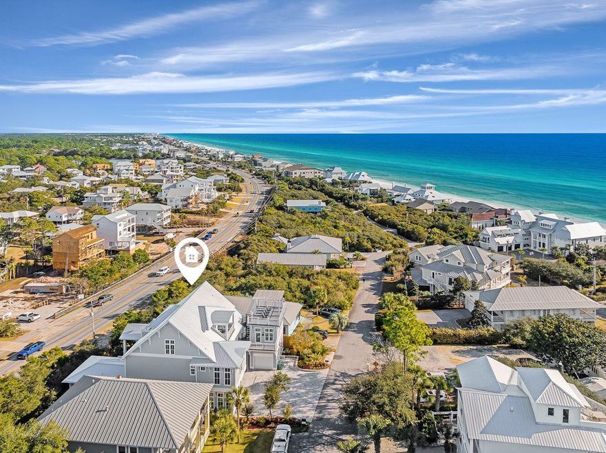 The Optimist'  on 30A has just seen a significant price enhancement with a $350,000 price improvement!Ideally perched on a crest with endless Gulf views, The Optimist offers the perfect beach lifestyle, located in a non-flood zone. This dynamic beach  property features multiple covered porches and a walkover to the private carriage house, with a sun deck on the third level offering breathtaking views from 30A to Destin and Panama City.There are two deeded beach accesses, one just a two-minute walk away, leading to 1,000 feet of sugar-white sand on the Gulf of Mexico. Indulge in resort-style living with nine bedrooms, seven and two  half bathrooms; a detached full carriage house above the garage; state-of-the-art kitchen featuring a wet bar and wine refrigerator; a private elevator to all levels; and an expansive outdoor oasis designed for entertainment and relaxation with zero entry sleek poolside chaise lounges. Unwind in style at the swim-up bar, enjoy a fresh catch meal from the outdoor kitchen all while listening to surround sound vibes.

Entertaining is made easy with a Sub Zero 48'' refrigerator, Wolf SS 48'' dual fuel gas range, custom vent hood, convenient pot filler and coffee station, wet bar, and elevator. The opulent kitchen island with its waterfall marble countertop provides added seating. Step from this area through gorgeous Euro doors into a large, covered lanai bringing the outdoors in with a lovely transitional area with a resort style pool, incorporated hot tub and waterfall feature that flows into the shallow area with sunbathing ledge. 

After an evening swim, gather by the sleek linear fire pit. Finally, retreat for relaxation in the primary king suite featuring french doors that open to the lanai and a sumptuous ensuite with a double spa shower and soaking tub. Follow the flow to the wet bar and an additional queen bedroom or an alternative as an office. 

Serene colors, calming textures, shiplap accents, designer lighting, and natural wood elements continue throughout the home. The second-floor wraps guests in luxury with three king bedrooms; each featuring its own private ensuite baths. One bedroom includes a small workout room with Peloton. The third and final level of the main house features a spacious media room with a queen sleeper, and two covered porch accesses, and crisp white bunk room featuring two twin over twin, peekaboo porthole gulf views and two full baths. A full home GENERAC generator complements the home.

The third level offers a private office suite with full kitchen and bath that could be converted to a seventh bedroom. 

Currently managed by Echelon with a strong track record of rental income and all furnishings conveying with the sale.