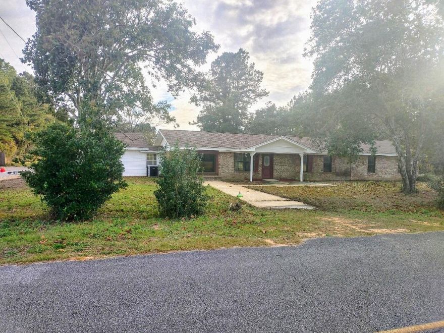 Large Family Home that needs renovating.  6 bed 2.5 bath on 1 acre.  New roof, XL workshop that's approximately 20'X100' including a separate building behind the workshop that is approximately 20'X20'. The master bedroom itself is approximately 20'X30'.  This one has a ton of potential.