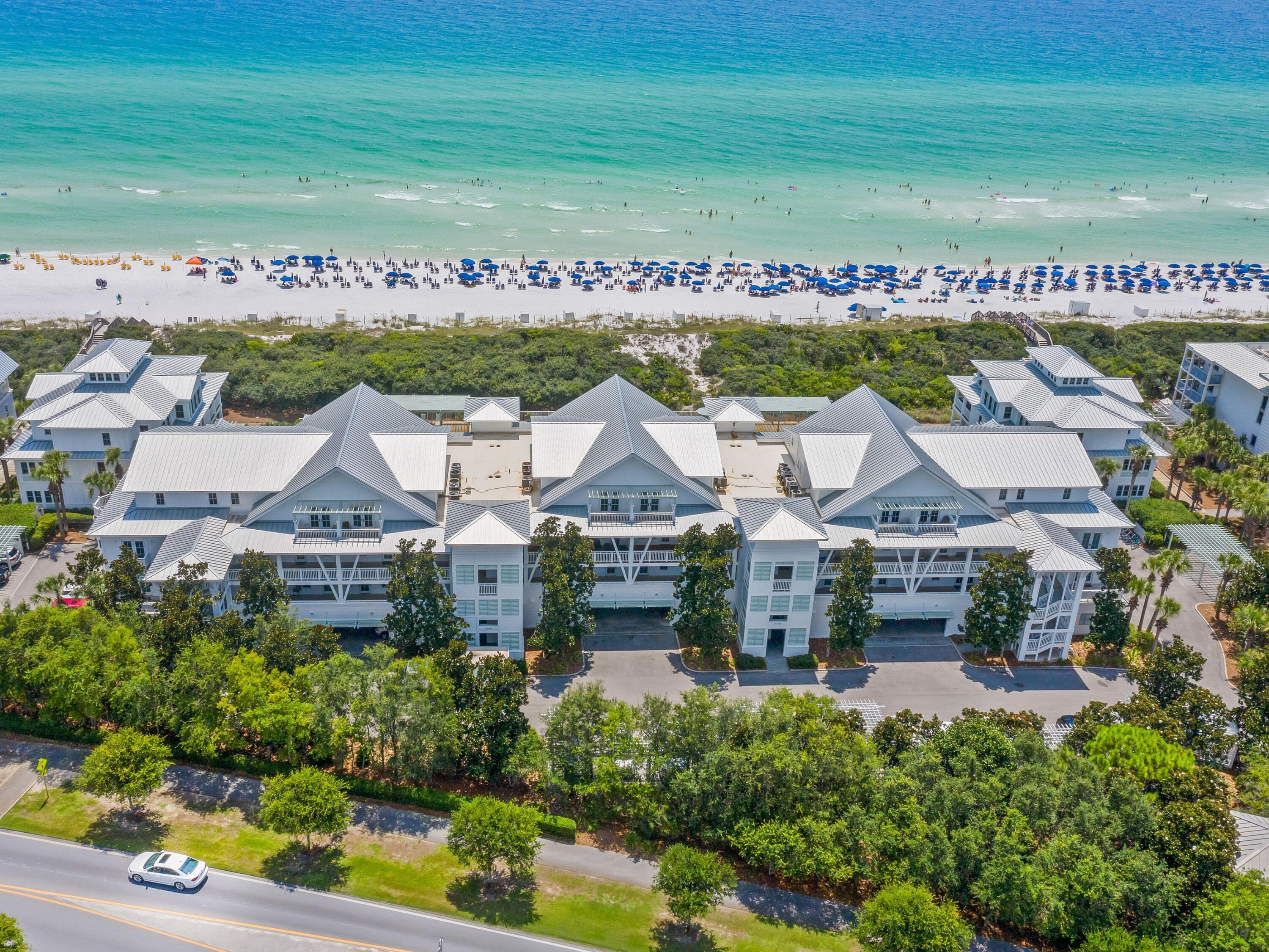 Enjoy all the exclusive benefits of WaterColor living from this magnificent gulf-view condo. Beautifully remodeled, it has new wood flooring and fresh decor along with new windows and doors recently replaced by the HOA. The sun-kissed living room has a bank of windows with light filtering softly through plantation shutters. French doors open onto a terrace with an inviting path leading to the nearby pool, beach and amenities. Chefs will delight in the unusually spacious well-appointed kitchen, something rarely found in other condos. Dark mahogany cabinets are topped with beautiful marble granite countertops. The center island with its gas range and hood is conveniently situated for chatting with guests at the dining table while cooking dinner.