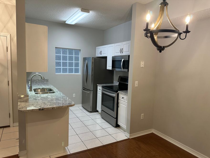Immediate Occupancy! Second floor 3 BEDROOM, 2 BATH unit with vaulted ceilings and hardwood floors, and lots of upgrades to include new countertops and flooring! Beautiful balcony overlooks the swimming pool and Gazebo. Text Tiffani 850-797-0681 For more information and viewing. Small pets allowed with owner approval. Non smoking unit.