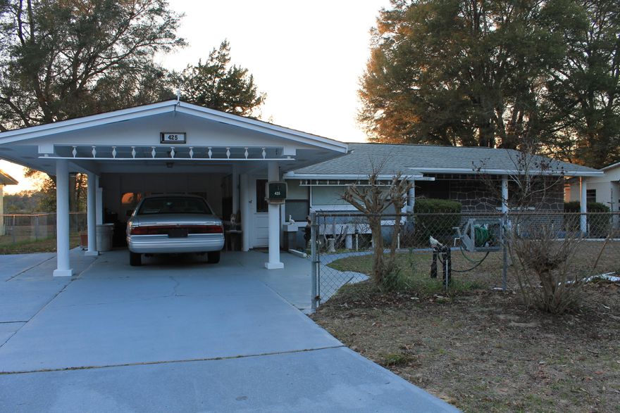 Available immediately is this lovingly maintained 3 bedroom, 2.5 bathroom home with 1 car garage and carport in Valparaiso. Although the heated and cooled sq. ft. of this home is 1,221 sf, this home lives so much larger. The owners had a professionally built FL room added to the back of this home providing an additional nearly 500 sf of living. Heated and cooled by a brand new window unit, this space has tons of natural light with windows and numerous sky lights. The owners also added a full bathroom in this space with stand up shower that is heated and cooled. Upon entry to the home, you will immediately notice the spacious living room. Underneath the carpet in the living room and all three bedrooms is beautiful parquet wood floors. There are 3 generous bedrooms w/ ample